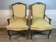 Pair of French Carved Arm Chairs