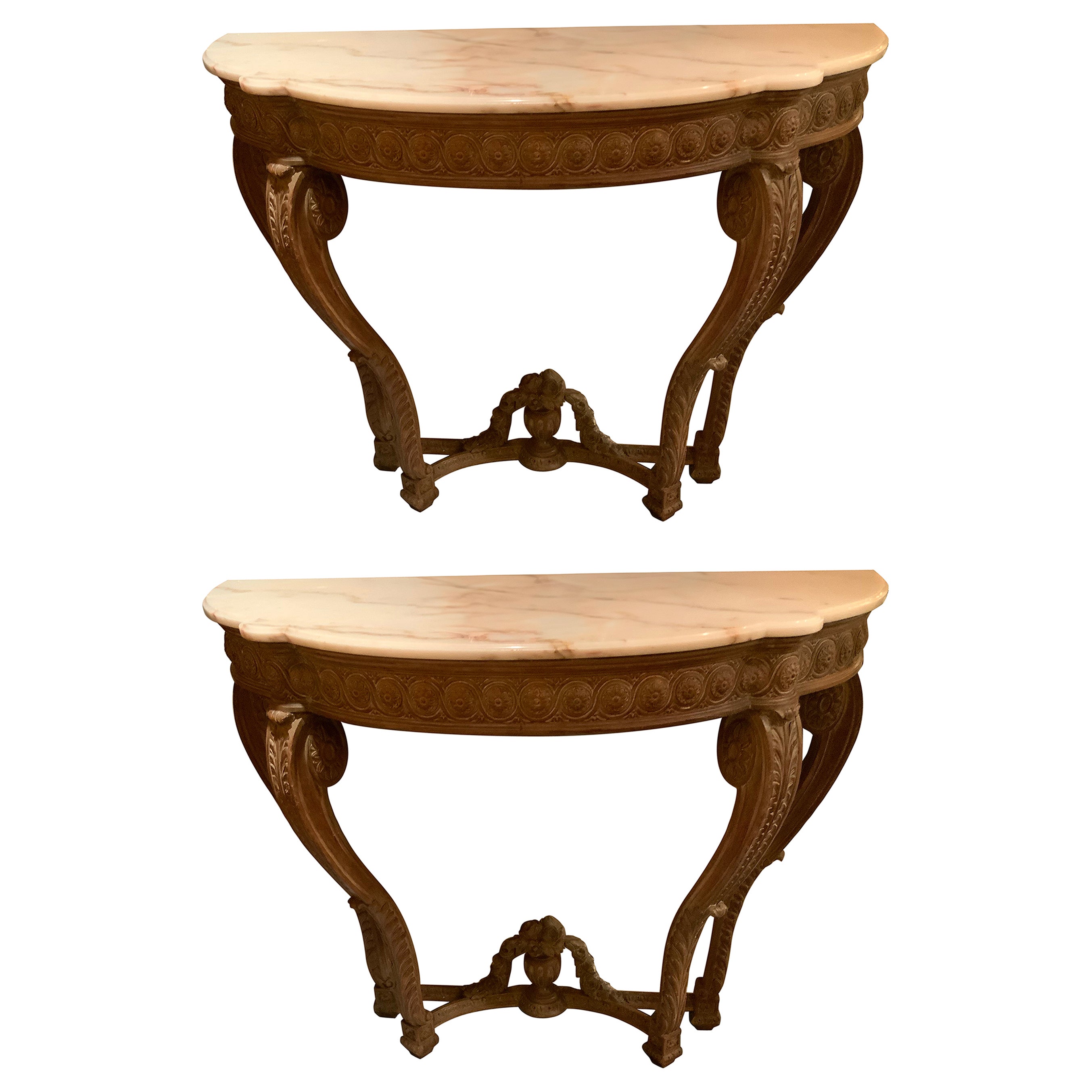 Pair of French carved Demi lune shaped console tables with white marble tops For Sale
