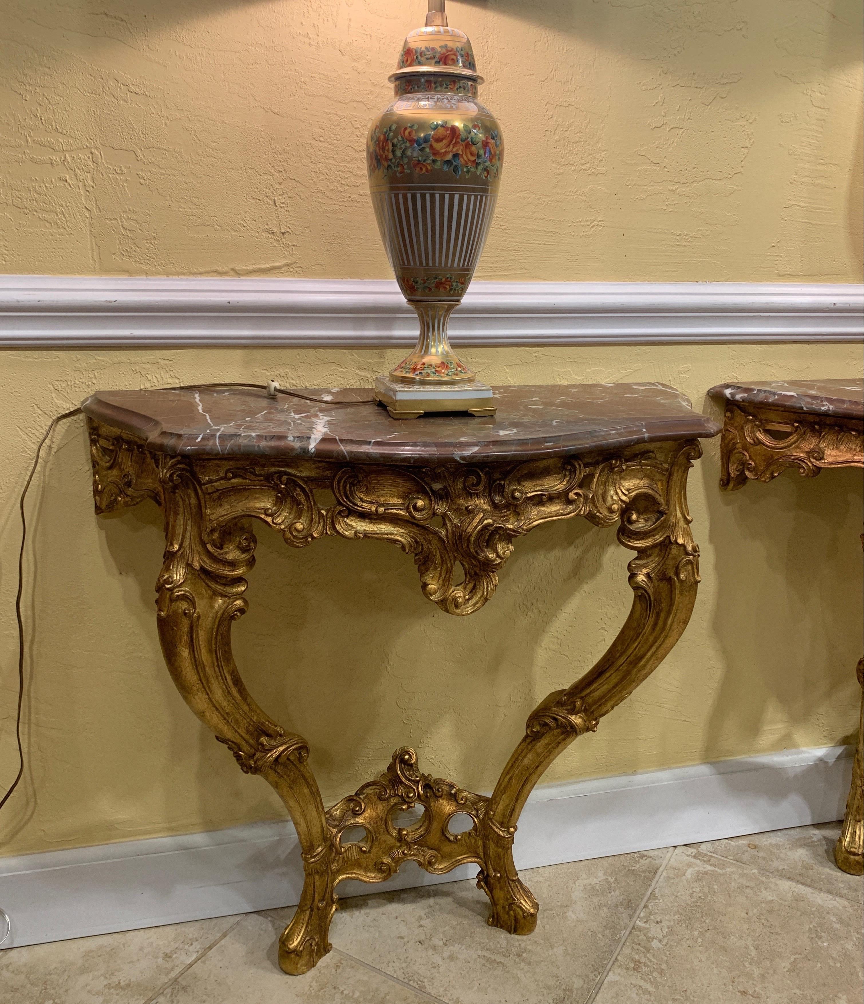 Pair of French Carved and Gilt Rococo Style Marble Top Consoles In Good Condition In Ft. Lauderdale, FL