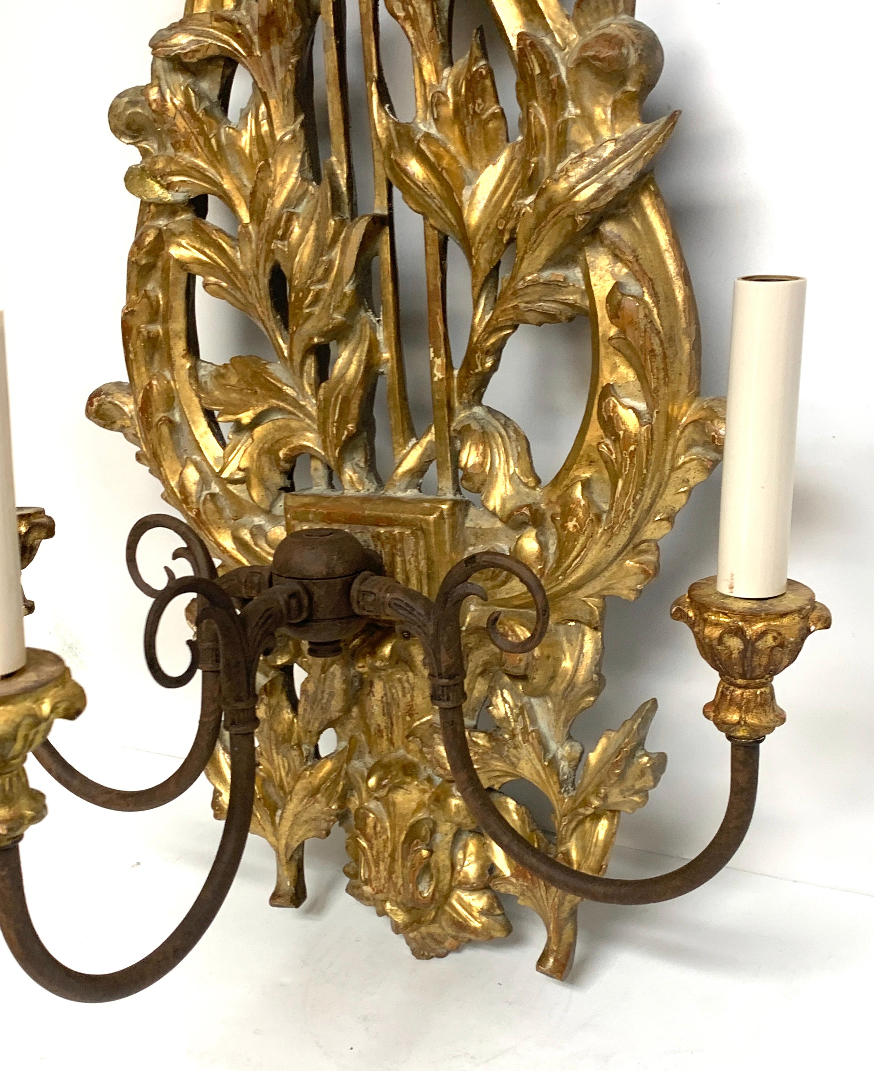 Pair of French Carved Giltwood Lyre Motif Three Light Wall Sconces  1