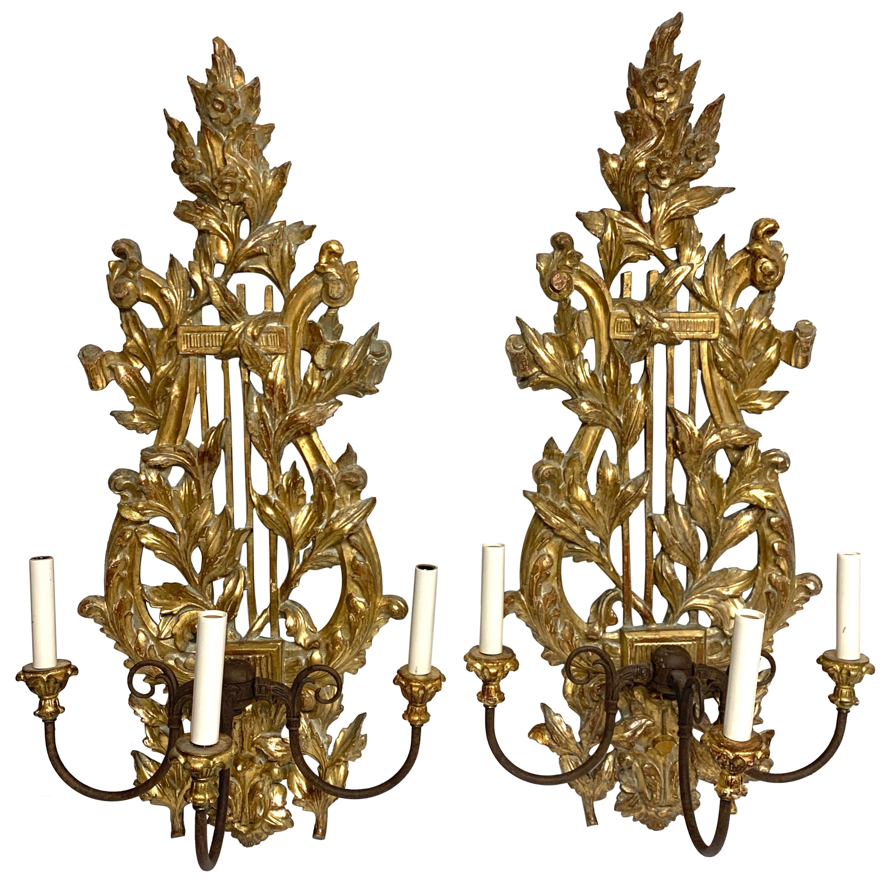 Pair of French Carved Giltwood Lyre Motif Three Light Wall Sconces 