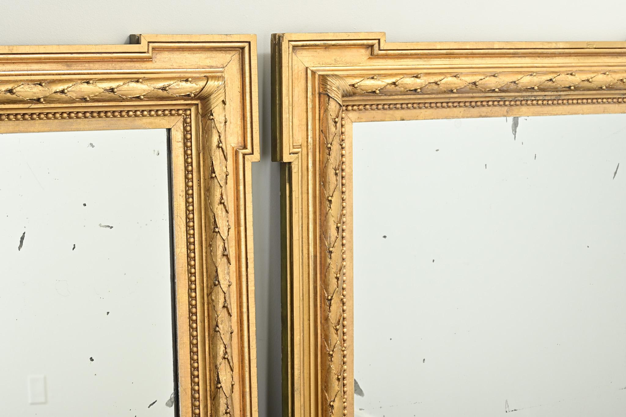 Hand-Carved Pair of French Carved Gold Gilt Mirrors For Sale