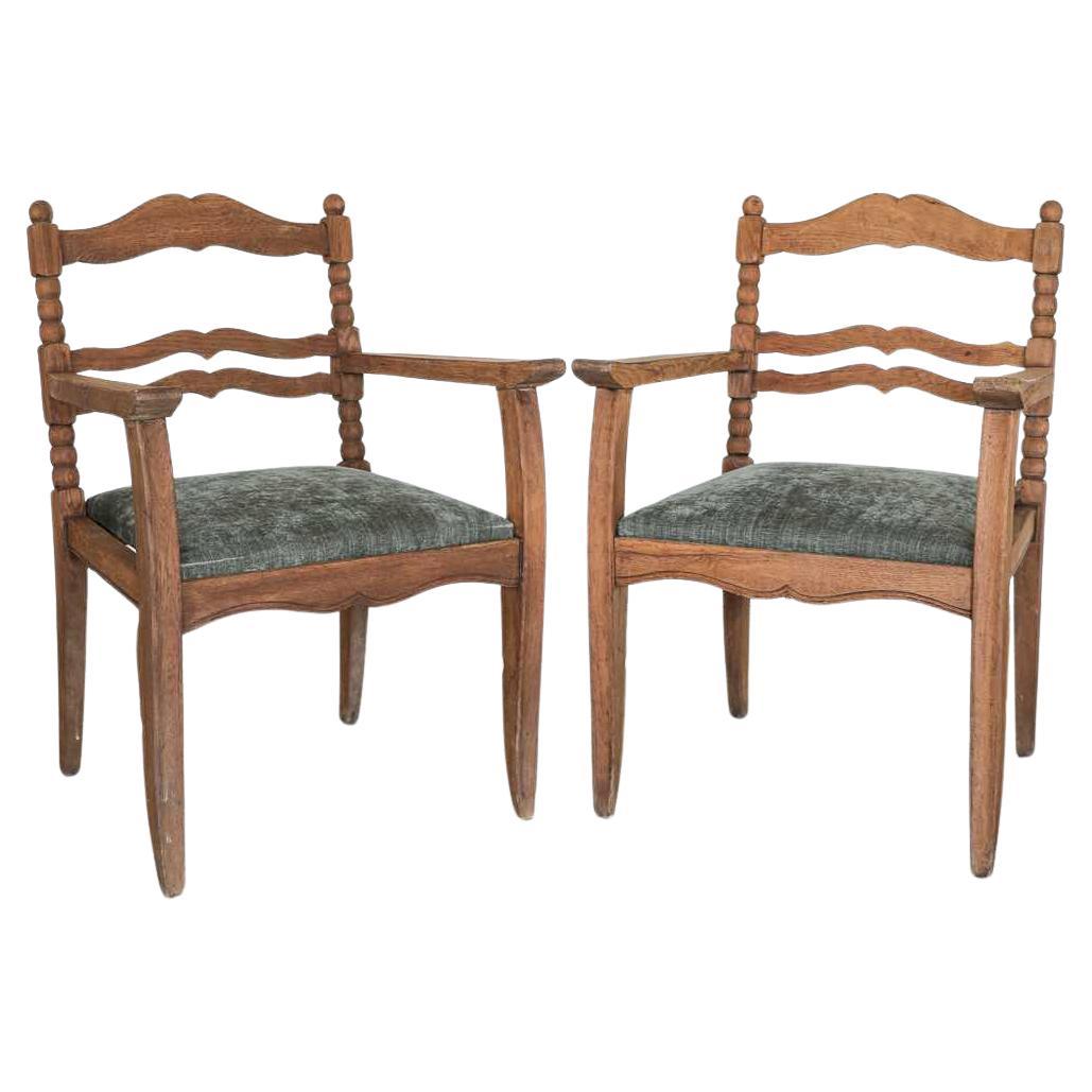 Pair of French Carved Oak Armchairs For Sale