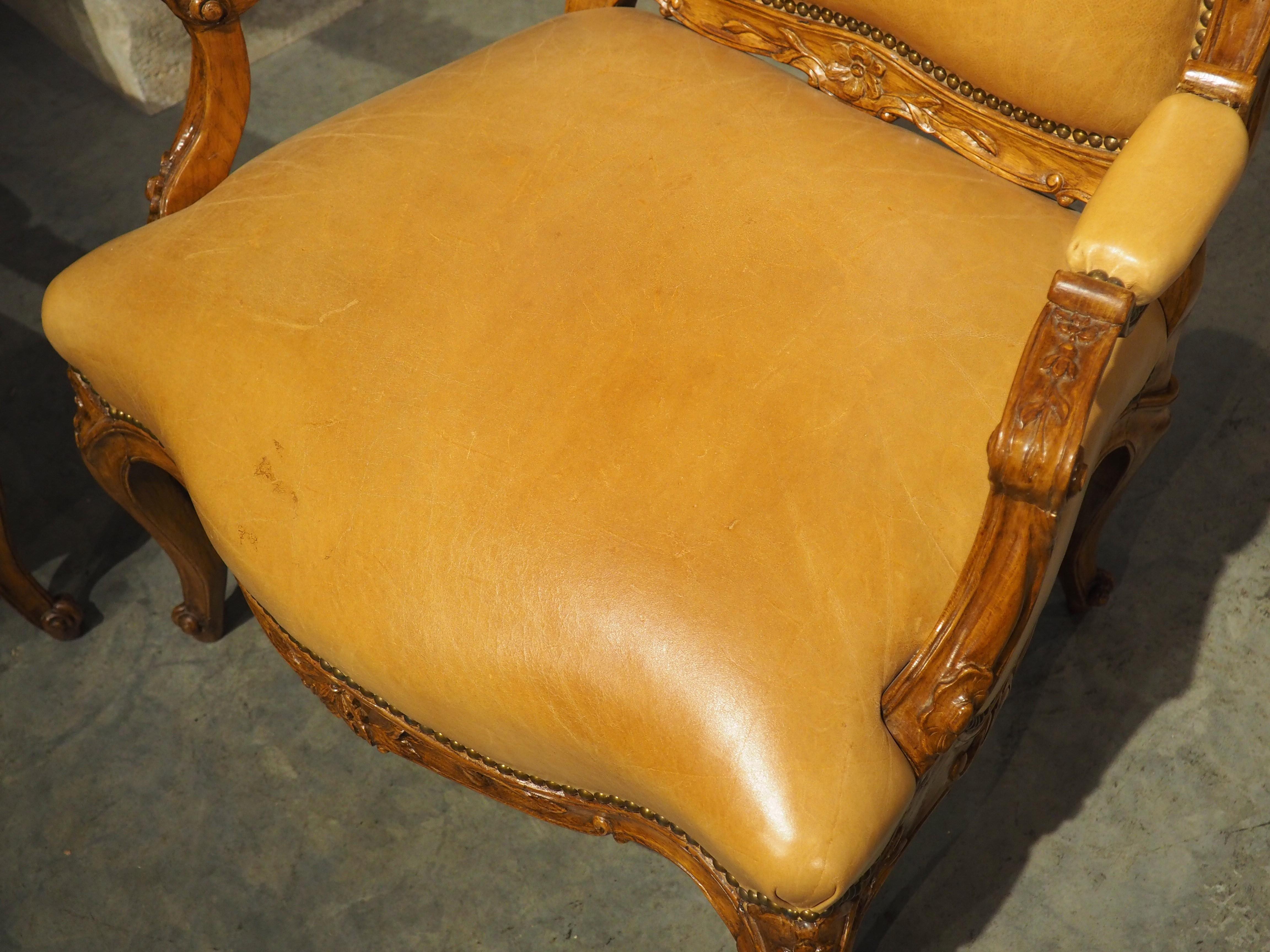 Pair of French Carved Regence Style Armchairs with Leather Upholstery, C. 1900 In Good Condition For Sale In Dallas, TX