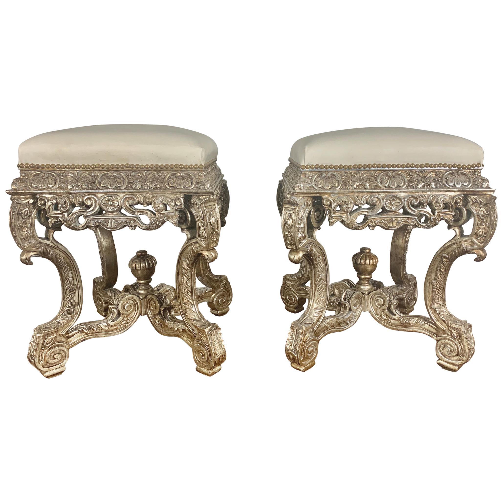 Pair of French Carved Silver Gilt and Leather Benches