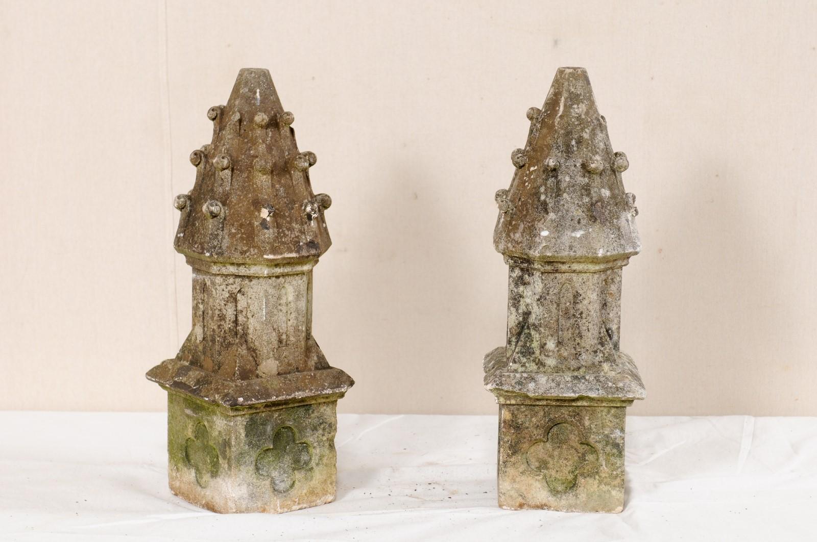 A French pair of carved stone and nicely adorn finial garden fragments. This vintage pair of French fragments, each standing approximately 23