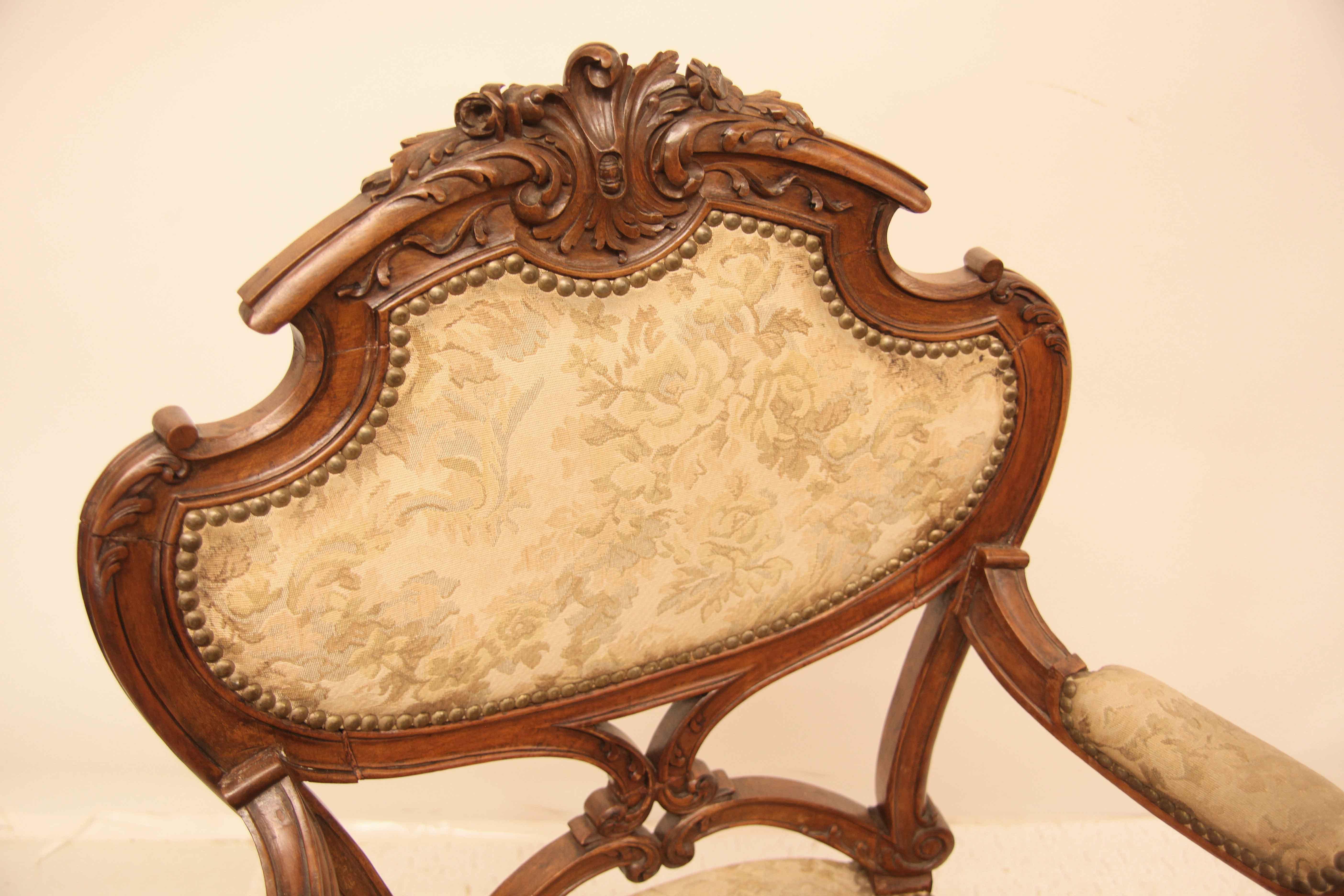 Hand-Carved Pair of French Carved Walnut Armchairs For Sale