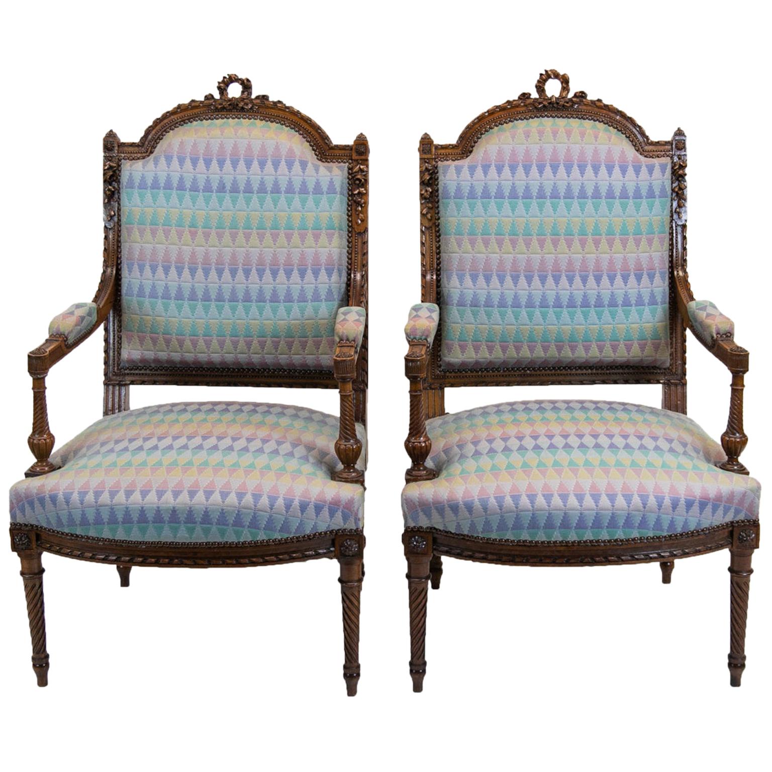 Pair of French Carved Walnut Bergère Armchairs For Sale