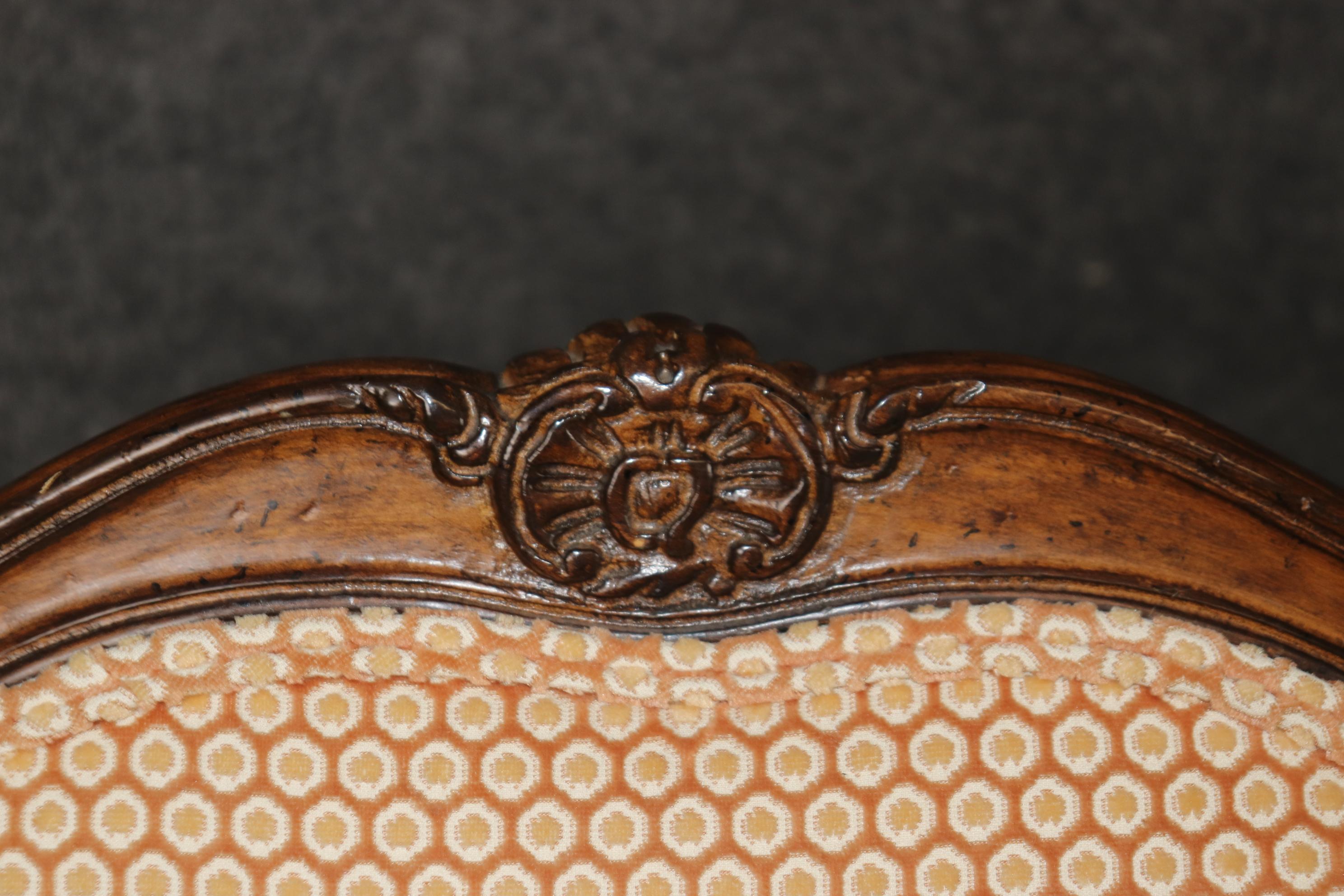 Pair of French Carved Walnut Louis XV Style Bergere Chairs For Sale 6