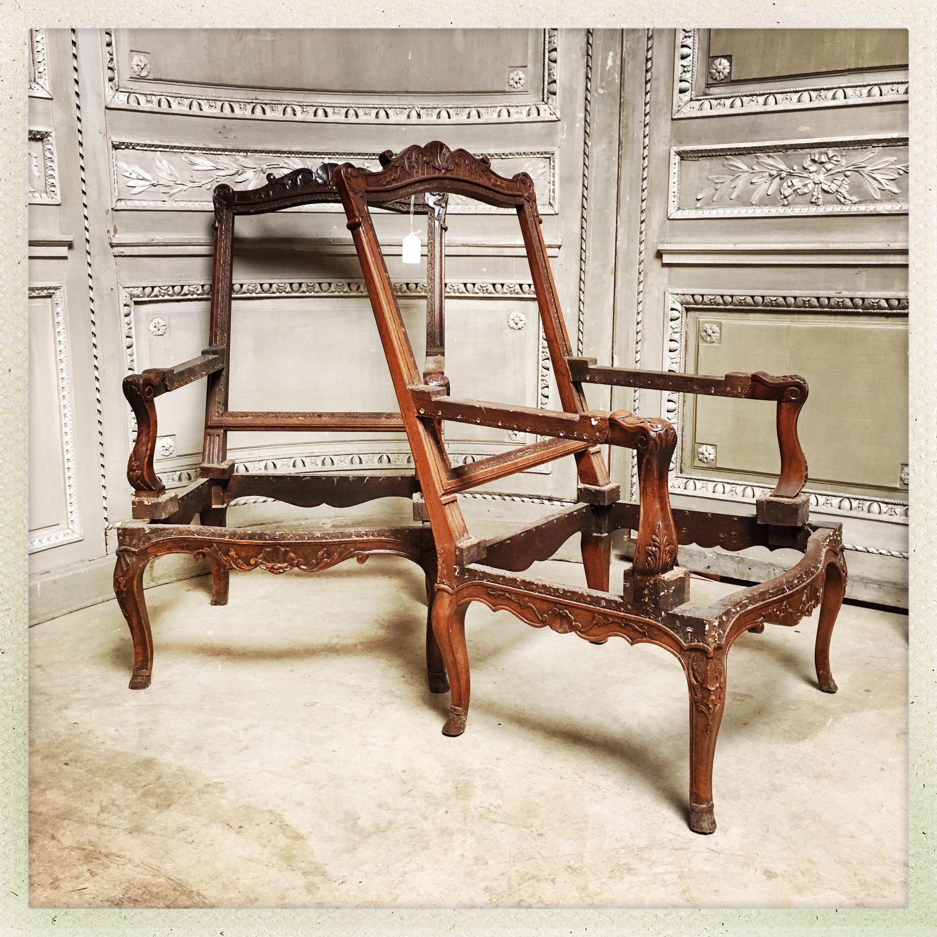Pair of French Carved Walnut Regence Style Fauteuils In Good Condition For Sale In Dallas, TX