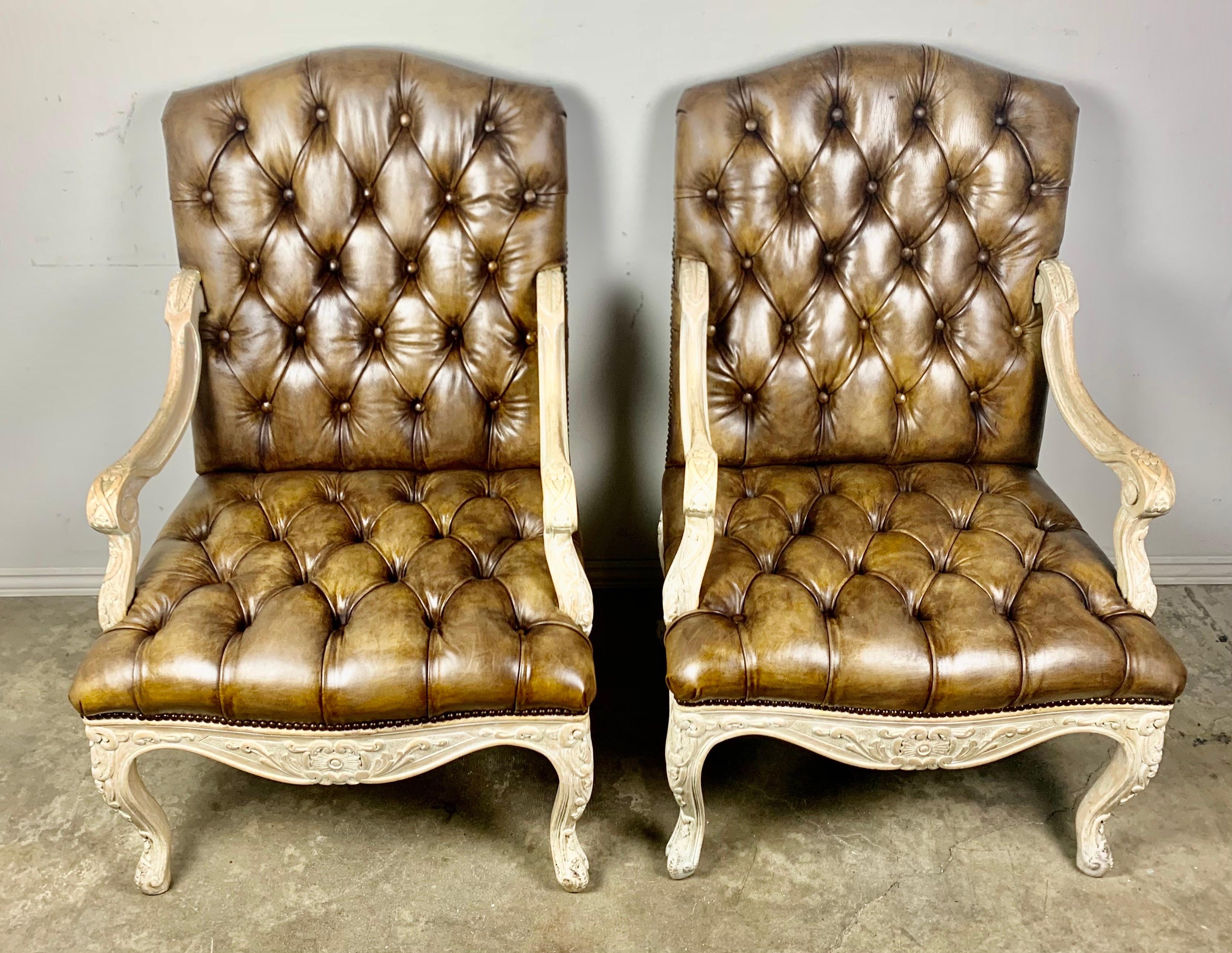 Pair of French Carved Wood Leather Tufted Armchairs In Distressed Condition In Los Angeles, CA