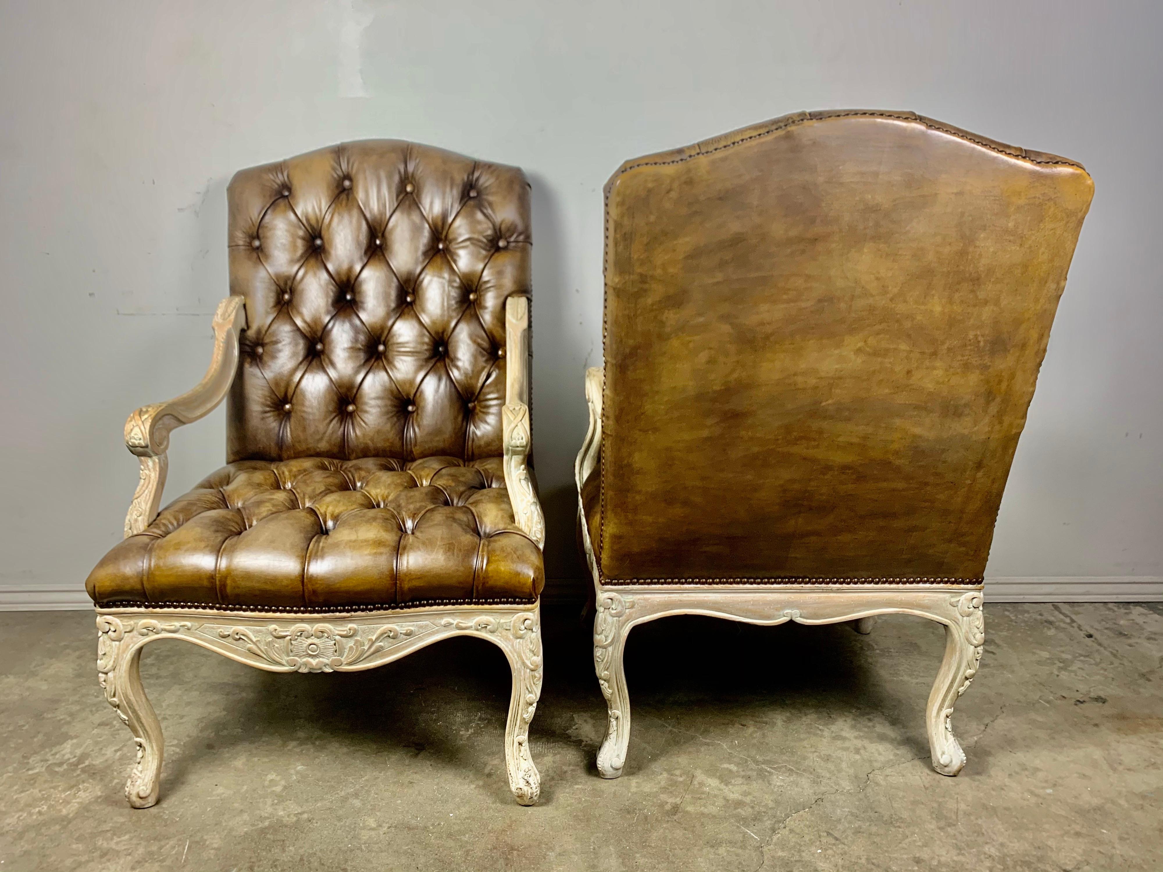 Louis XV Pair of French Carved Wood Leather Tufted Armchairs