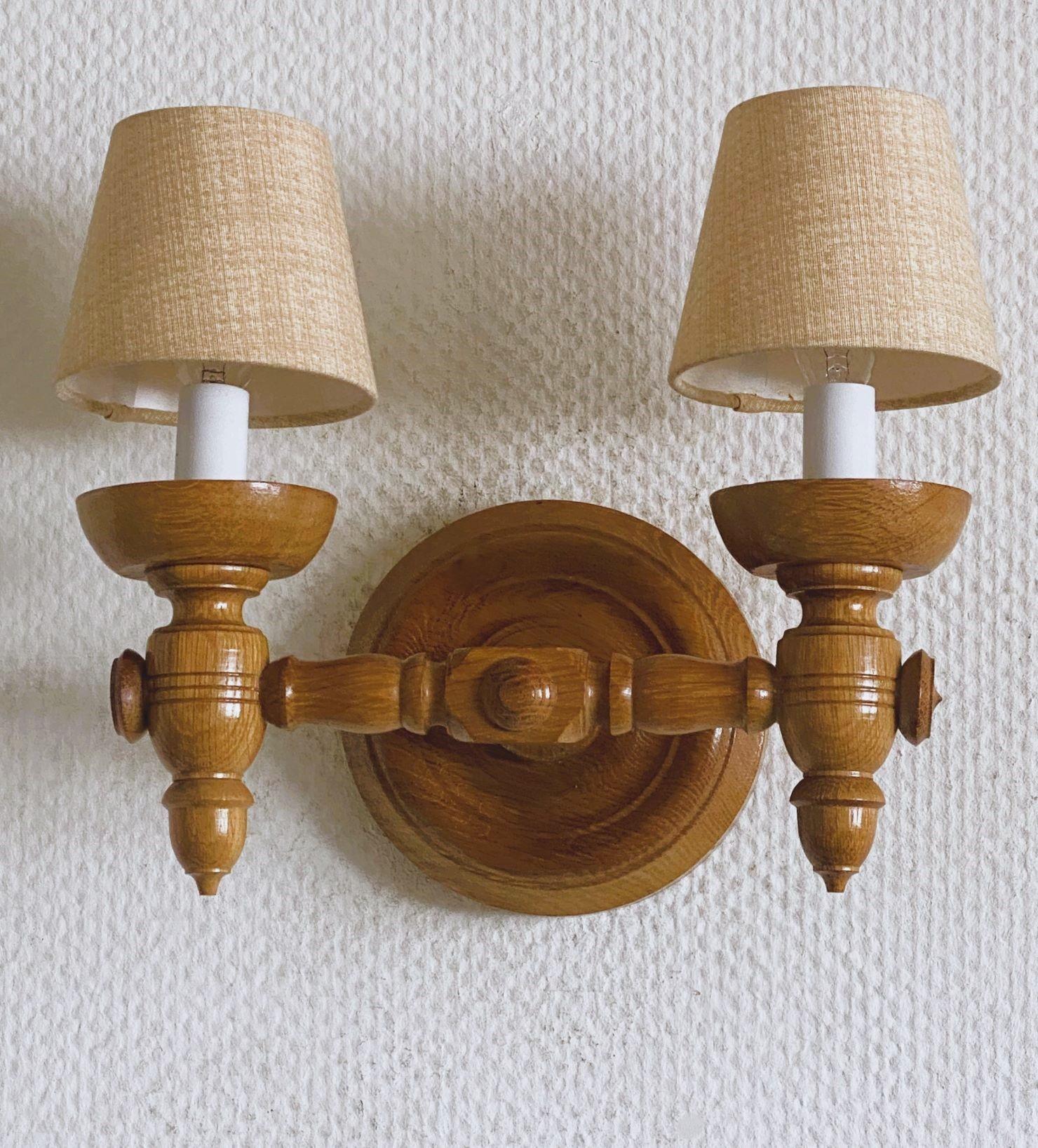 Mid-Century Modern Paire d'appliques murales en bois sculpté dans le style de Charles Dudouyt, années 1940 en vente