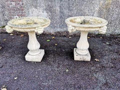 Pair of French Cast Concrete Garden Fountains with Medieval Heads to the Basins