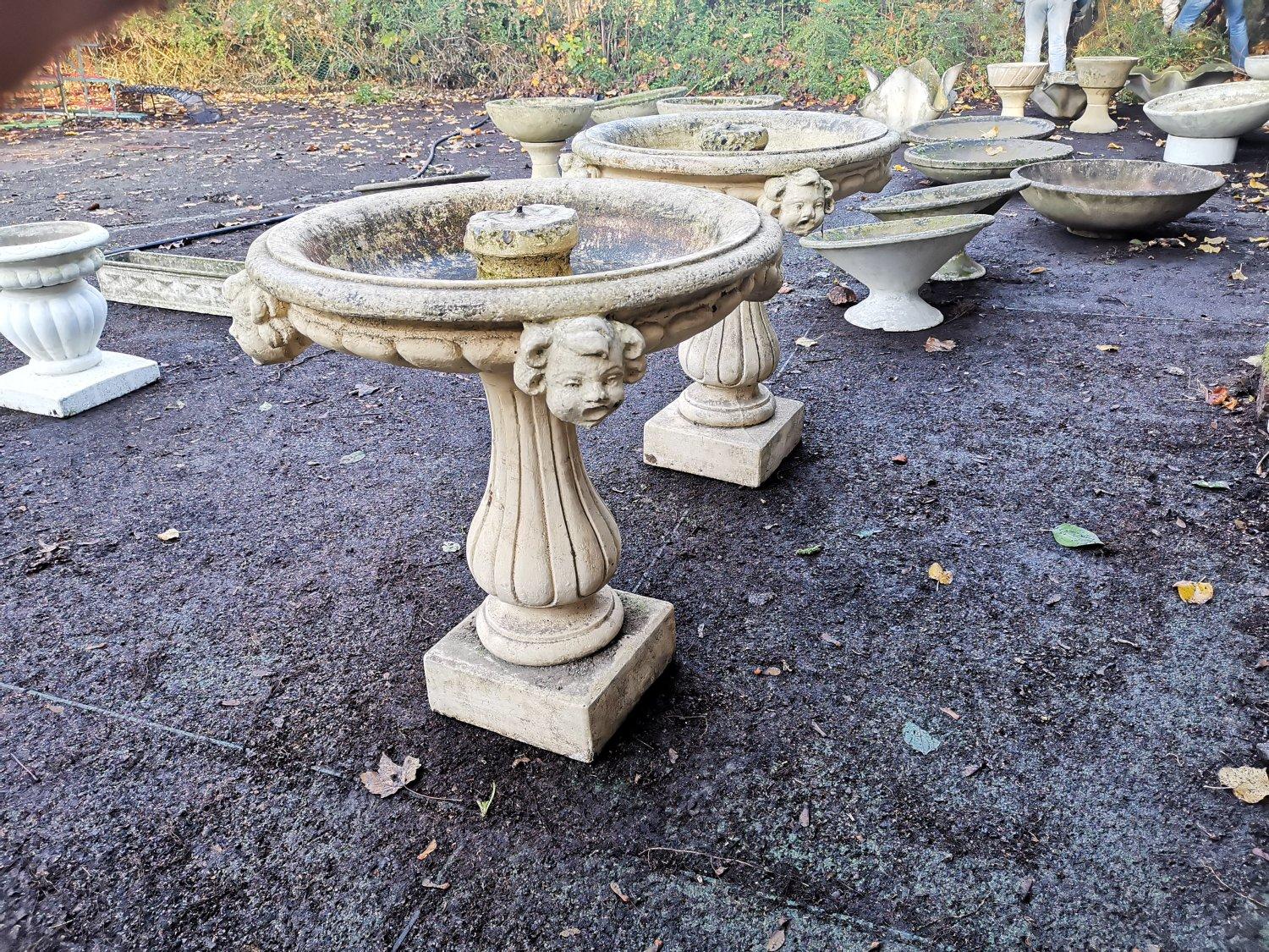 Mid-20th Century Pair of French Cast Concrete Garden Fountains with Medieval Heads to the Basins For Sale