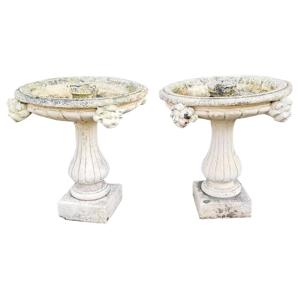 Pair of French Cast Concrete Garden Fountains with Medieval Heads to the Basins For Sale