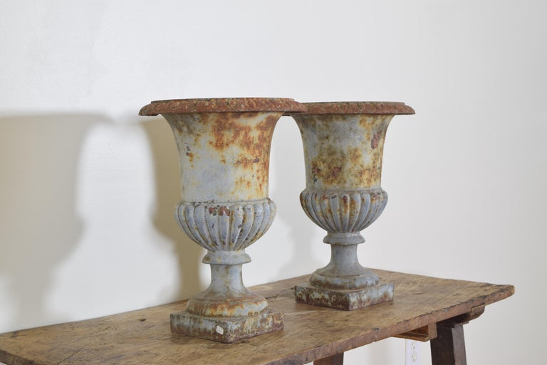 Pair of French Cast Iron and Parcel Painted Campana Form Urns Early 20th Century In Good Condition For Sale In Atlanta, GA