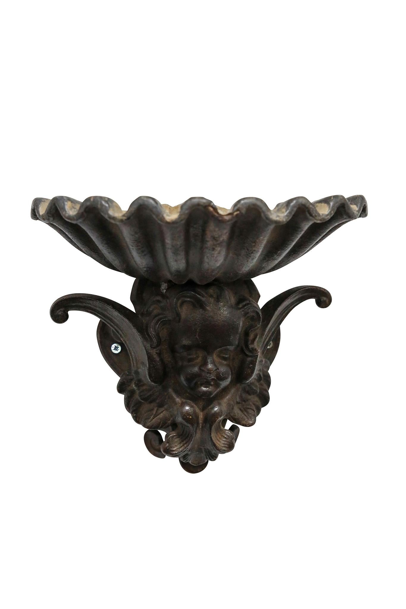 19th Century Pair of French Cast Iron Angel Head Vessels For Sale