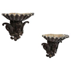 Pair of French Cast Iron Angel Head Vessels