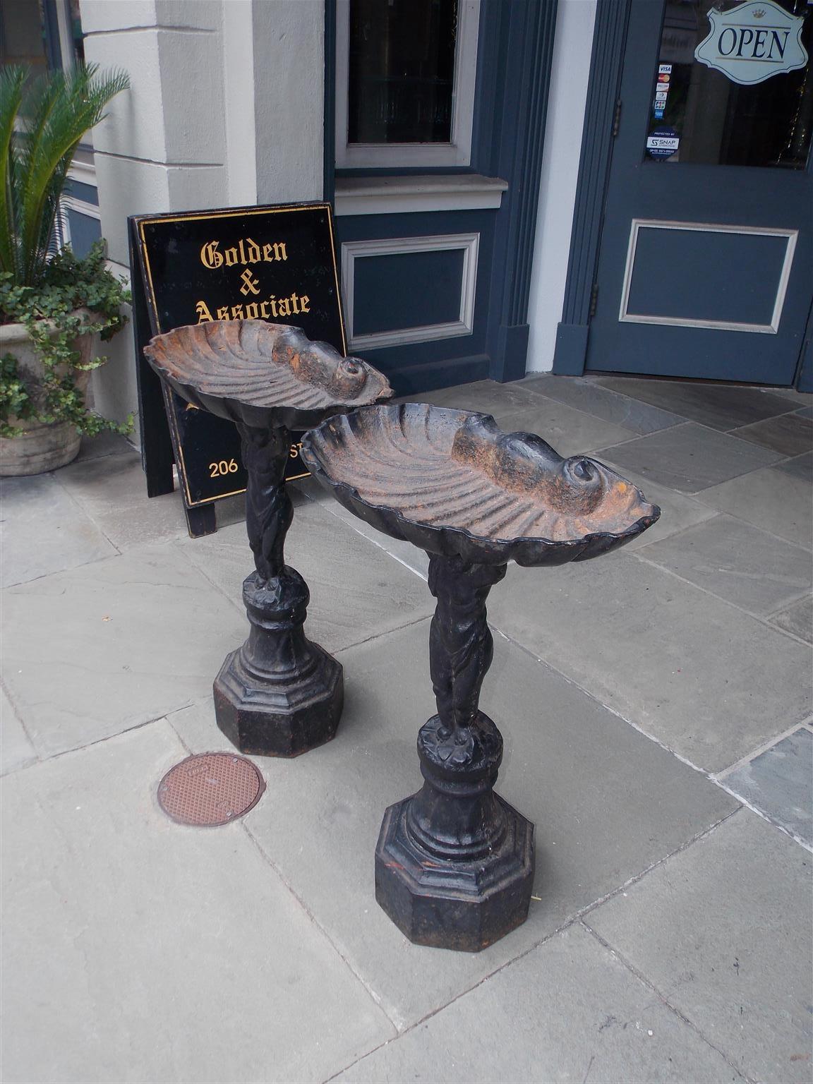 stone cherub bird bath