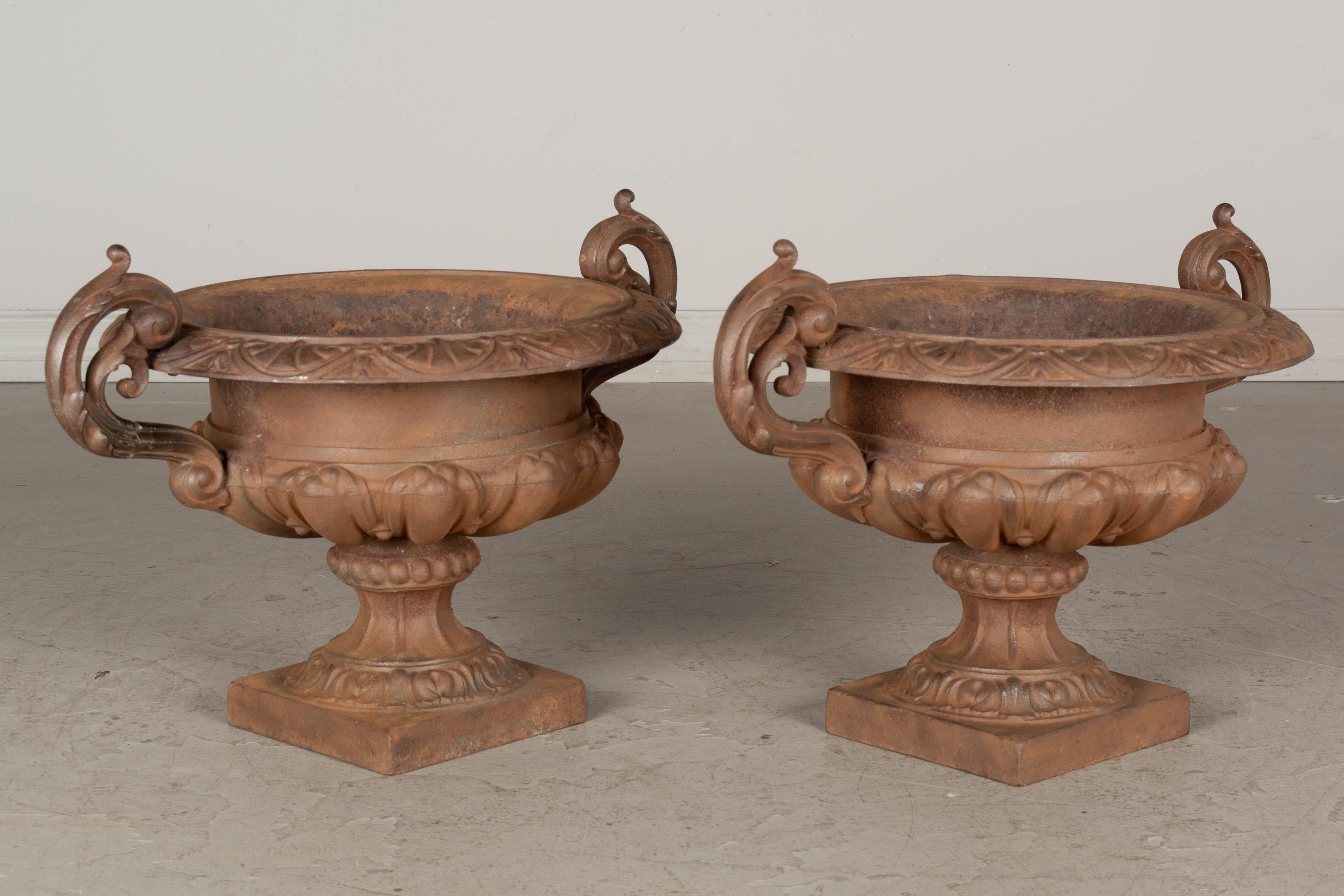 20th Century Pair of 19th Century French Cast Iron Garden Urns For Sale