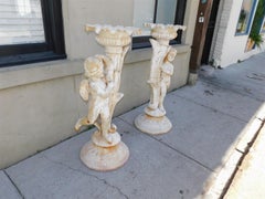 Pair of French Cast Iron Painted Cherub & Foliage Garden Torchieres, Circa 1820