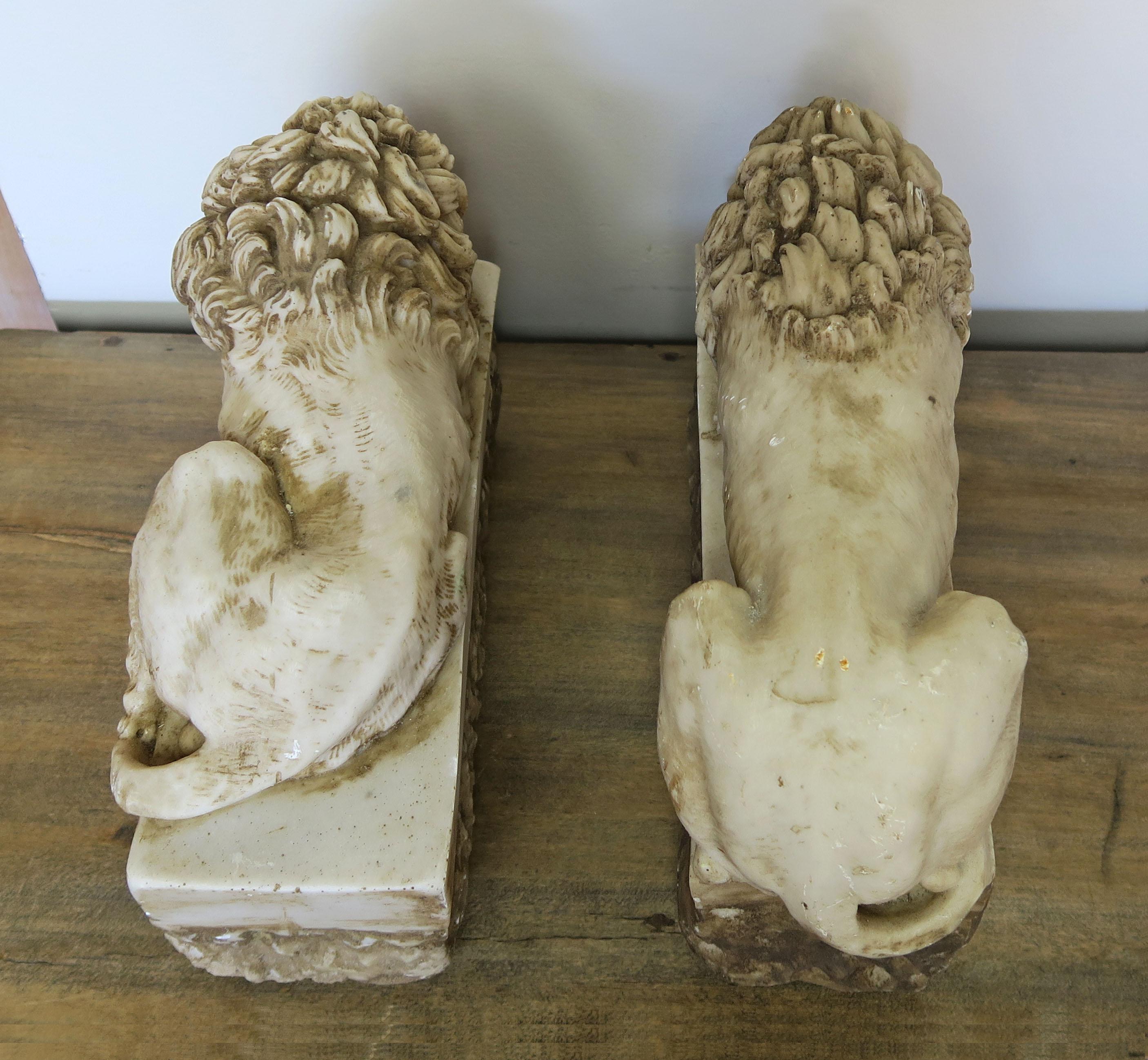 19th Century Pair of French Cast Stone Lions, circa 1900