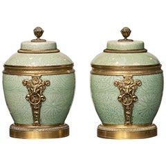 Pair of Regence Gilt-Bronze Glazed porcelain Mounted Celadon Lidded Vases