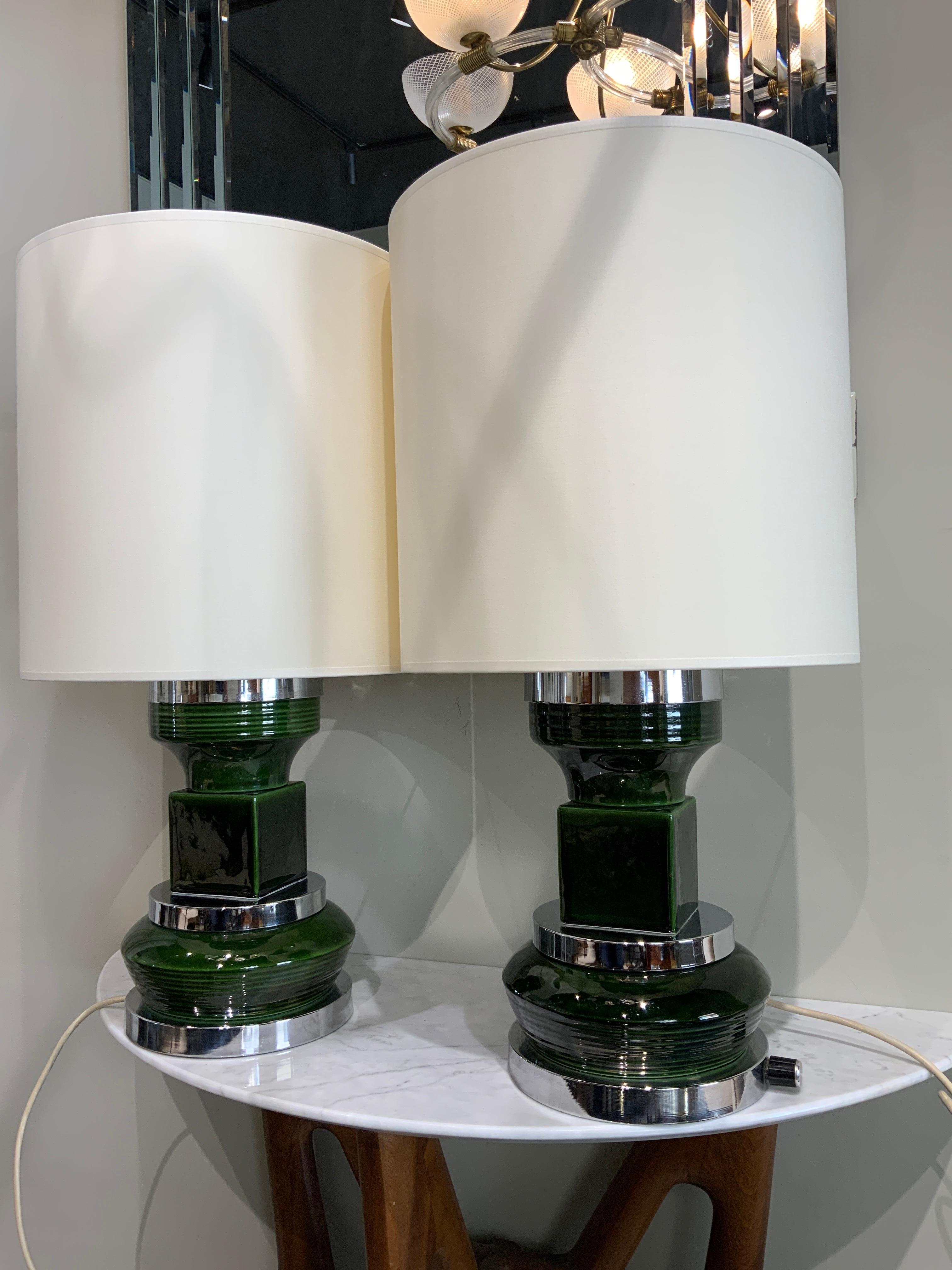 Rare and elegant pair of French ceramic lamps with steel base 
France circa 1970

Dimensions 

Base alone h 31 cm 