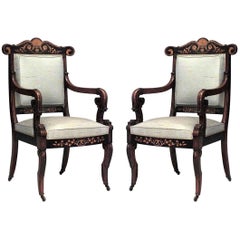 Coppia di poltrone francesi in palissandro Charles X