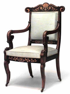 Par de sillones de palisandro de la época de Carlos X con tapizado verde, hacia 1840