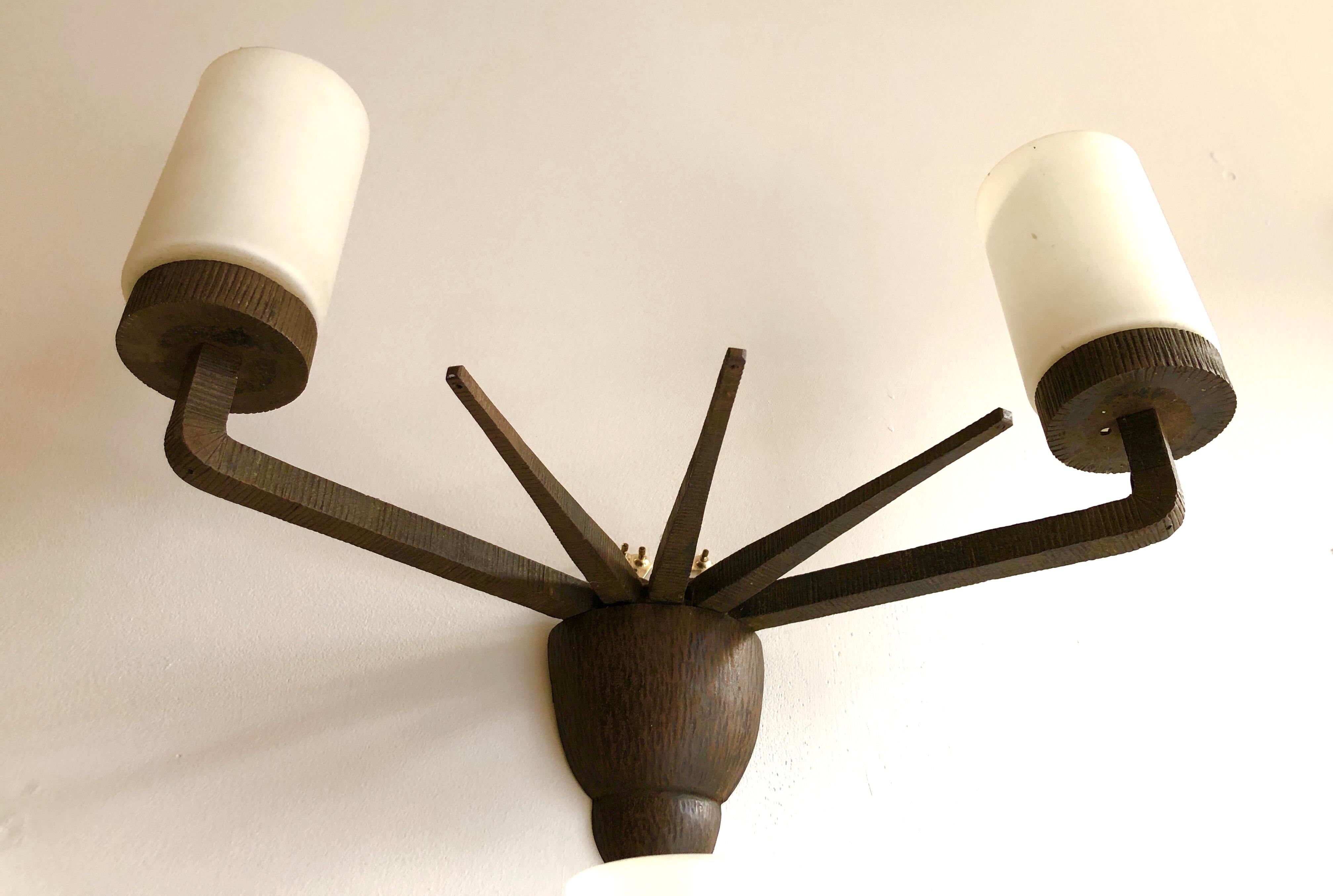 Art Deco Pair of French Chased Wrought Iron Sconces after Paul Kiss For Sale