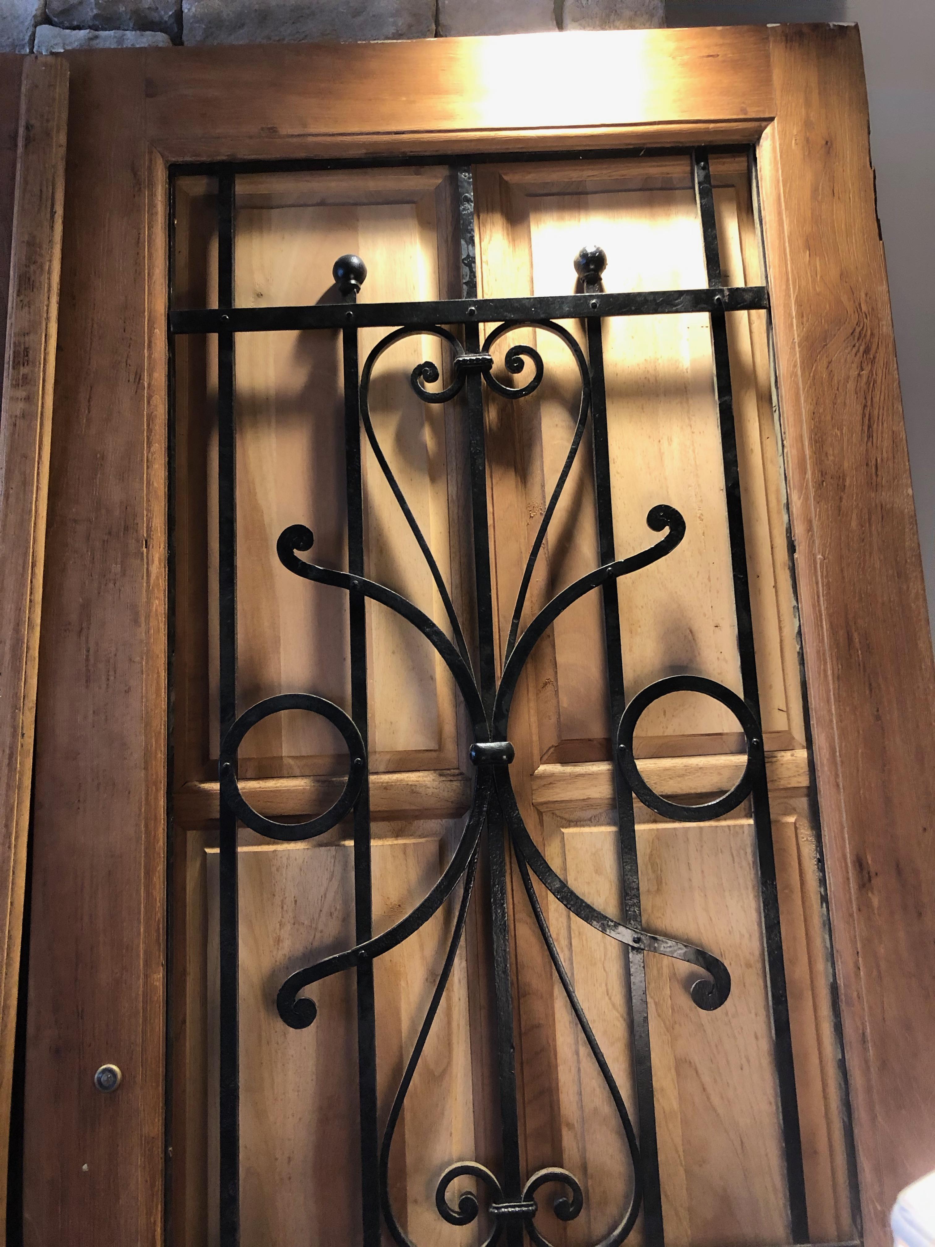 This pair of French chateau doors with brass round extra large handles and mail slit are from Argnon, France, circa 1880. This pair of doors also has the top and sides to mount to the walls (not shown). The top panels open to look out. Glass can be