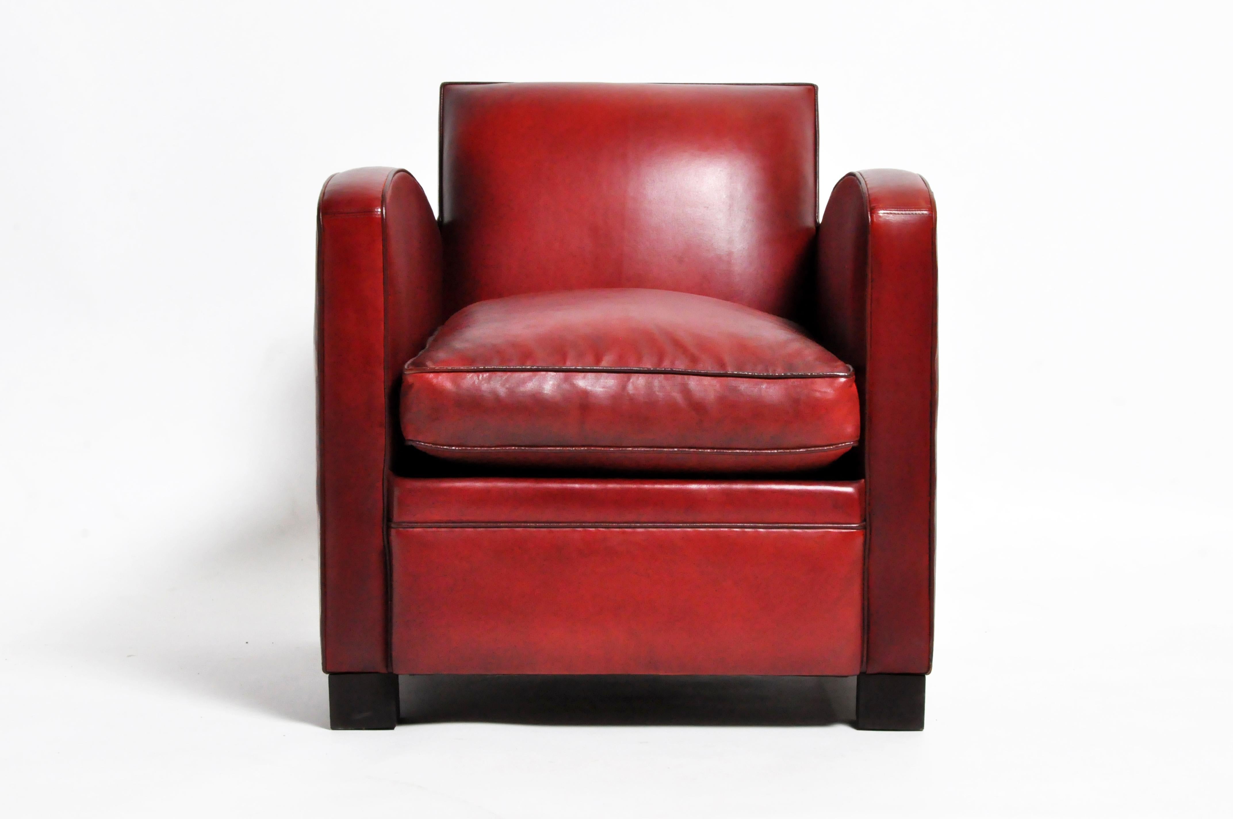 These elegantly-scaled Parisienne club chairs are newly made according to and Art Deco design. The leather is lamb leather and unusually soft and supple. These smaller club chairs are unusually comfortable (due to seat height and ample depth) and