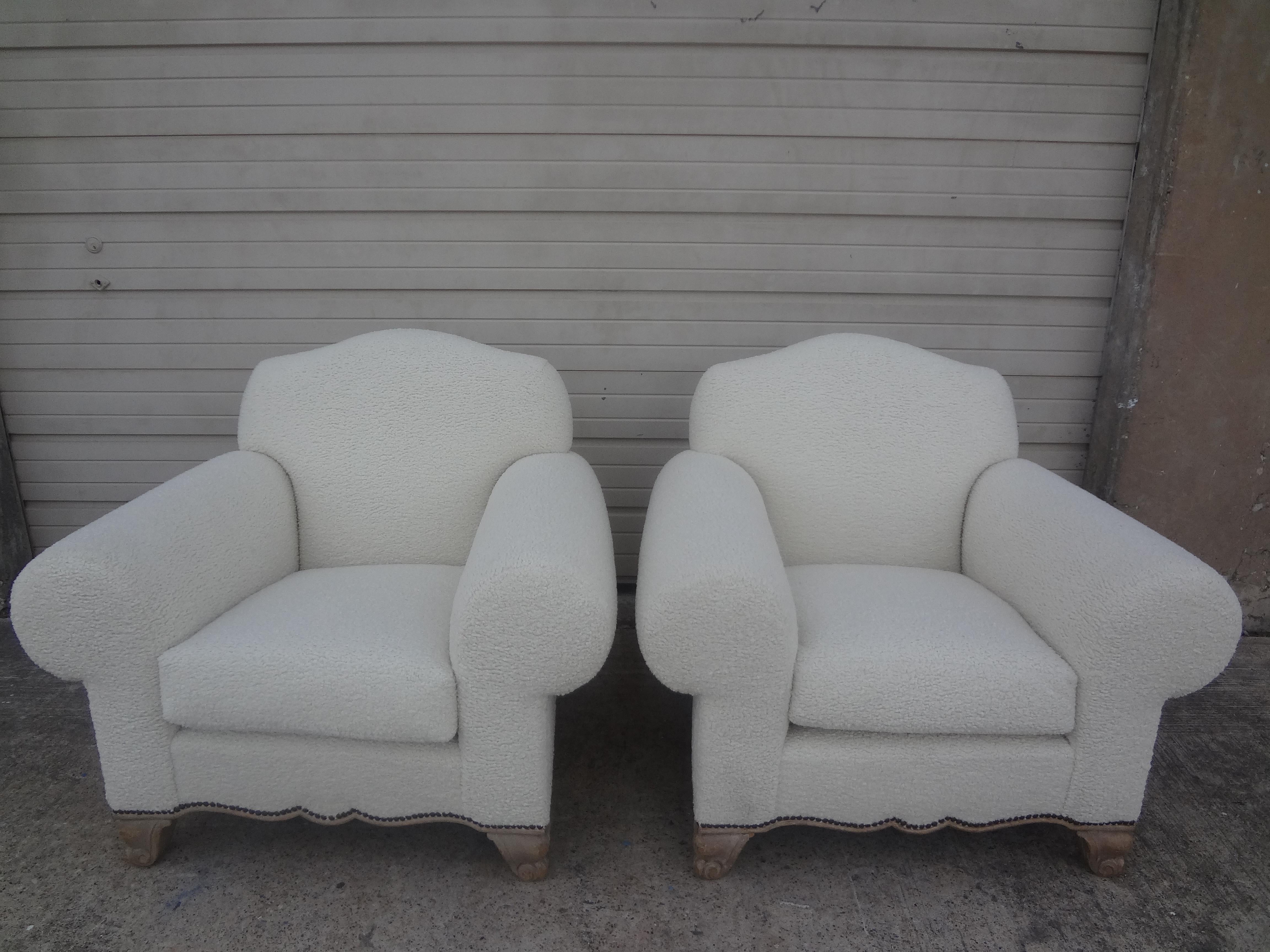 Pair of French Art Deco Club chairs by Jacques Adnet.
Pair of French club chairs or lounge chairs by Jacques Adnet. This stunning pair of sculptural French Art Deco club chairs, lounge chairs or side chairs have an unusual cerused oak frame and have