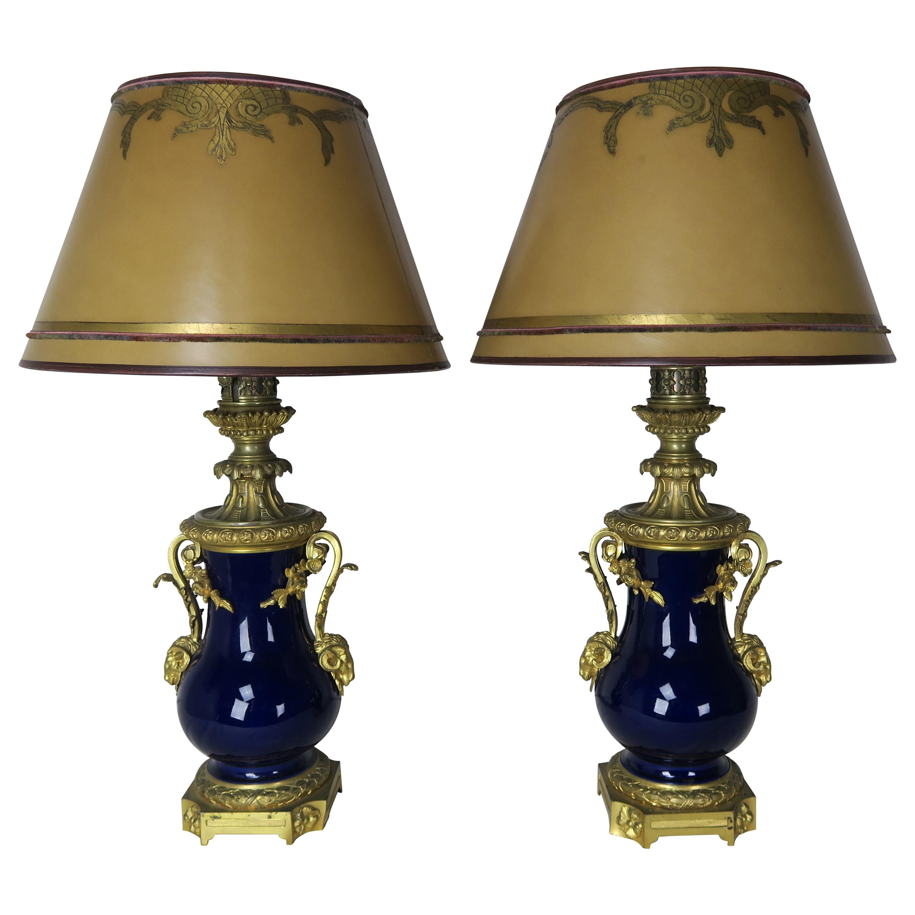 Pair of French Cobalt Blue Porcelain and Bronze Lamps with Parchment Shades