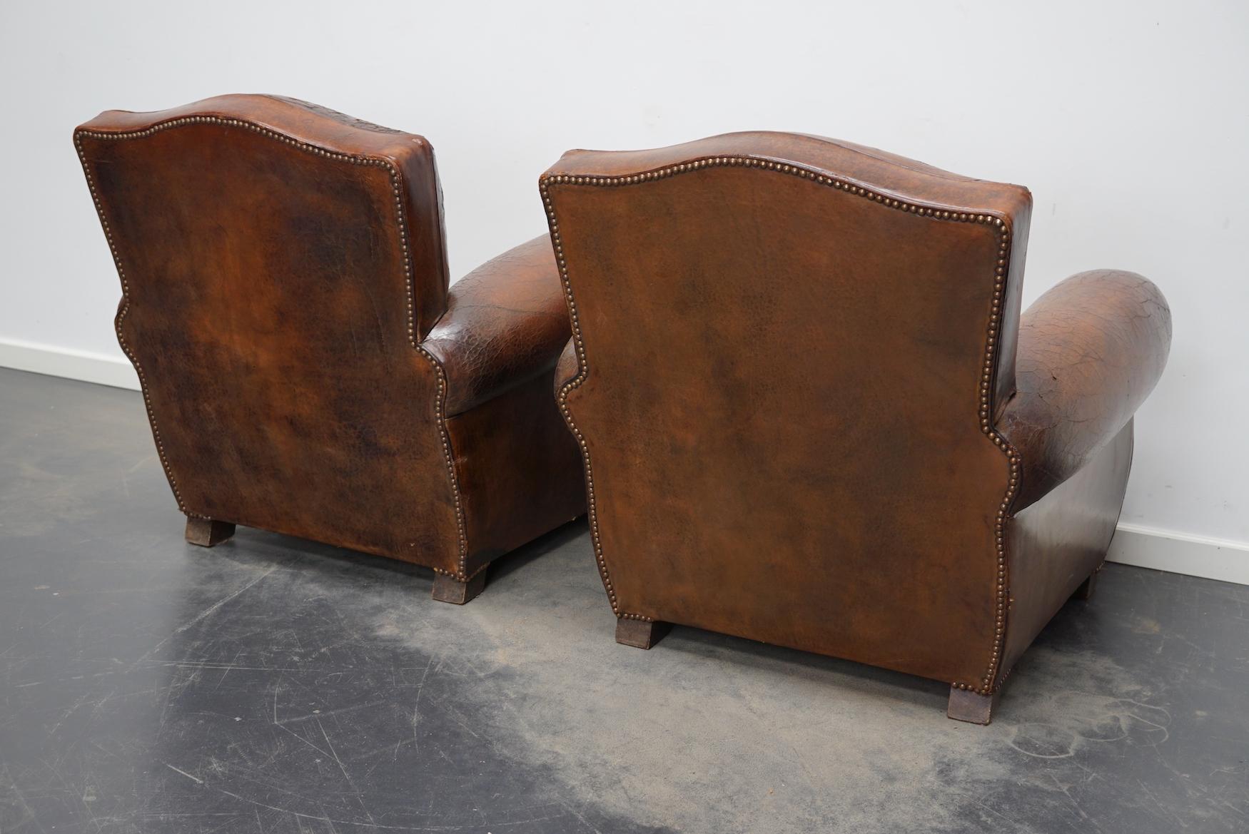 Mid-20th Century Pair of French Cognac Moustache Back Leather Club Chairs, 1940s