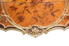 Pair of French Commodes in Louis XV style with Ormolu Mounts and Marquetry
