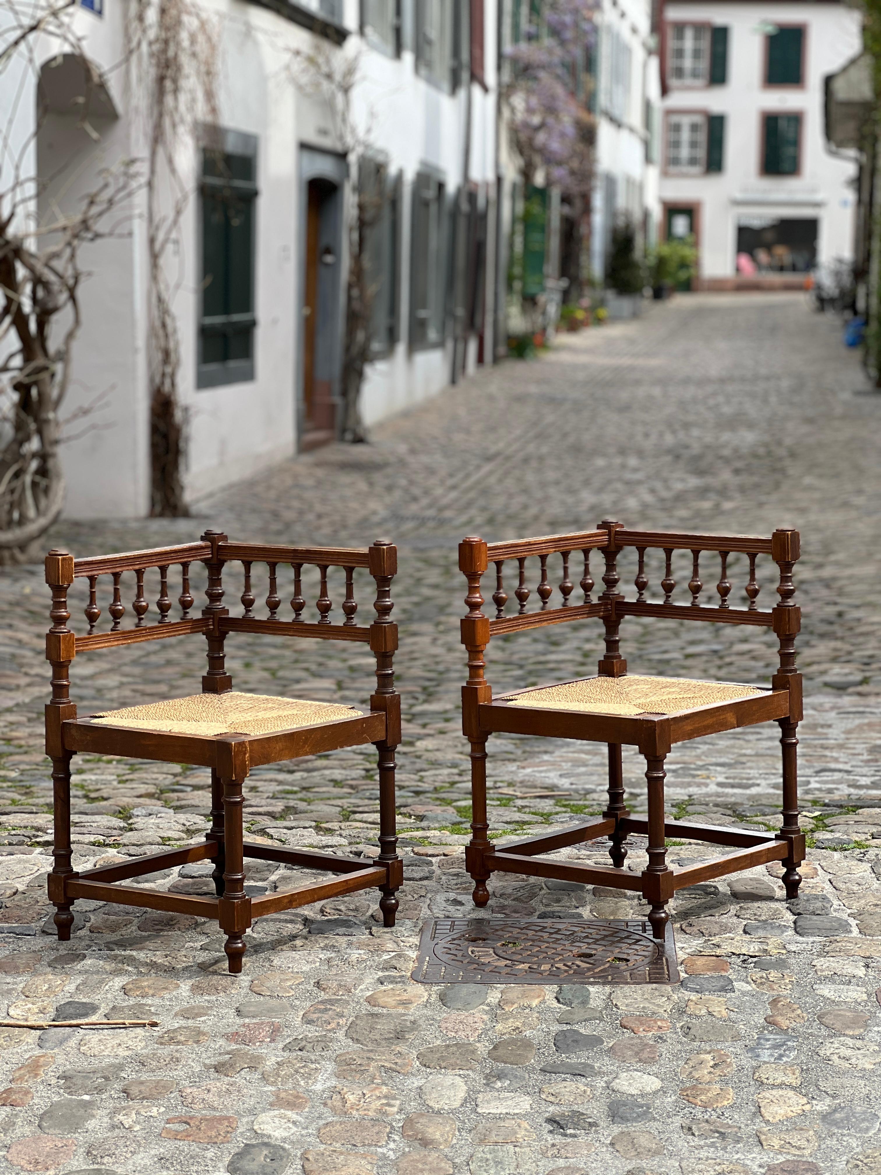 Add a sense of classic French charm to your home with this exquisite pair of 19th century corner chairs. These chairs have been carefully crafted with a meticulous attention to detail, making them a true statement of elegance and