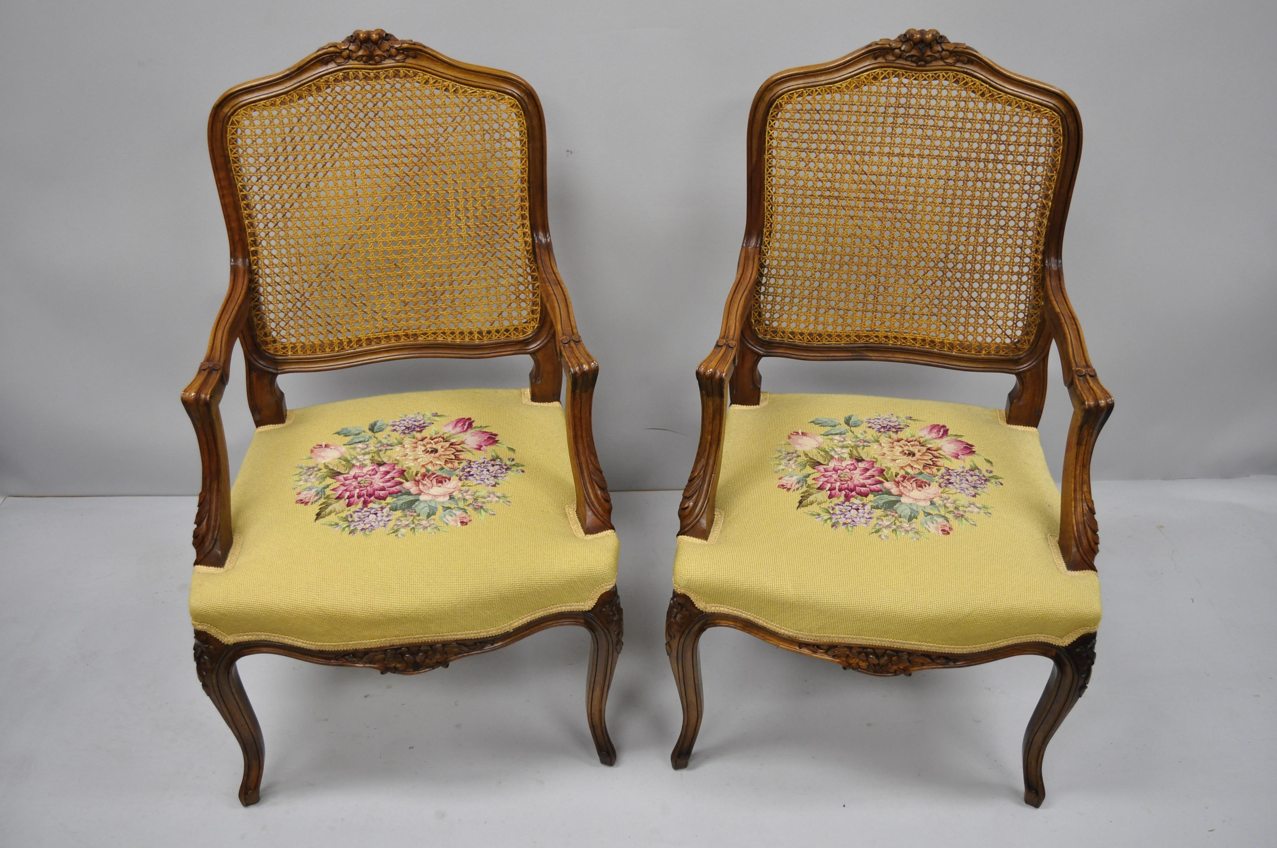 Pair of French Country Louis XV Style Cane Back Chair Needlepoint Armchairs In Fair Condition In Philadelphia, PA