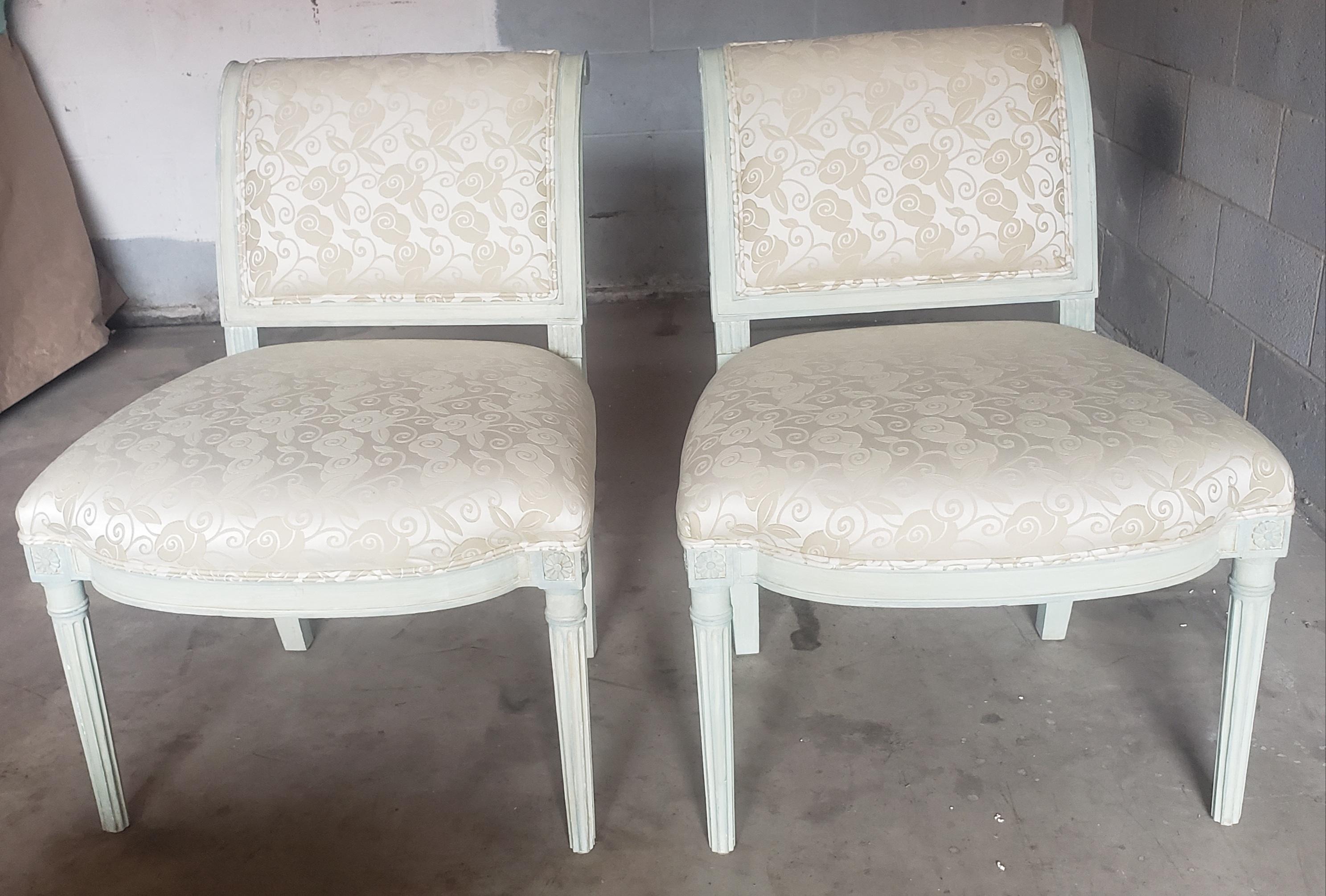 An exquisite pair of French Country Mahogany and Upholstered Slipper Lounge Chairs in excellent vintage condition. Newer High quality upholstery in excellent condition.