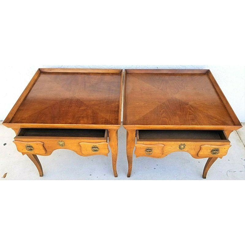 Offering One Of Our Recent Palm Beach Estate Fine Furniture Acquisitions Of A 1950's Pair of Baker Milling Road French Country Solid Wood Side End Tables
Each with a single pull-out drawer.

Approximate Measurements in Inches
26.75 x 26.75