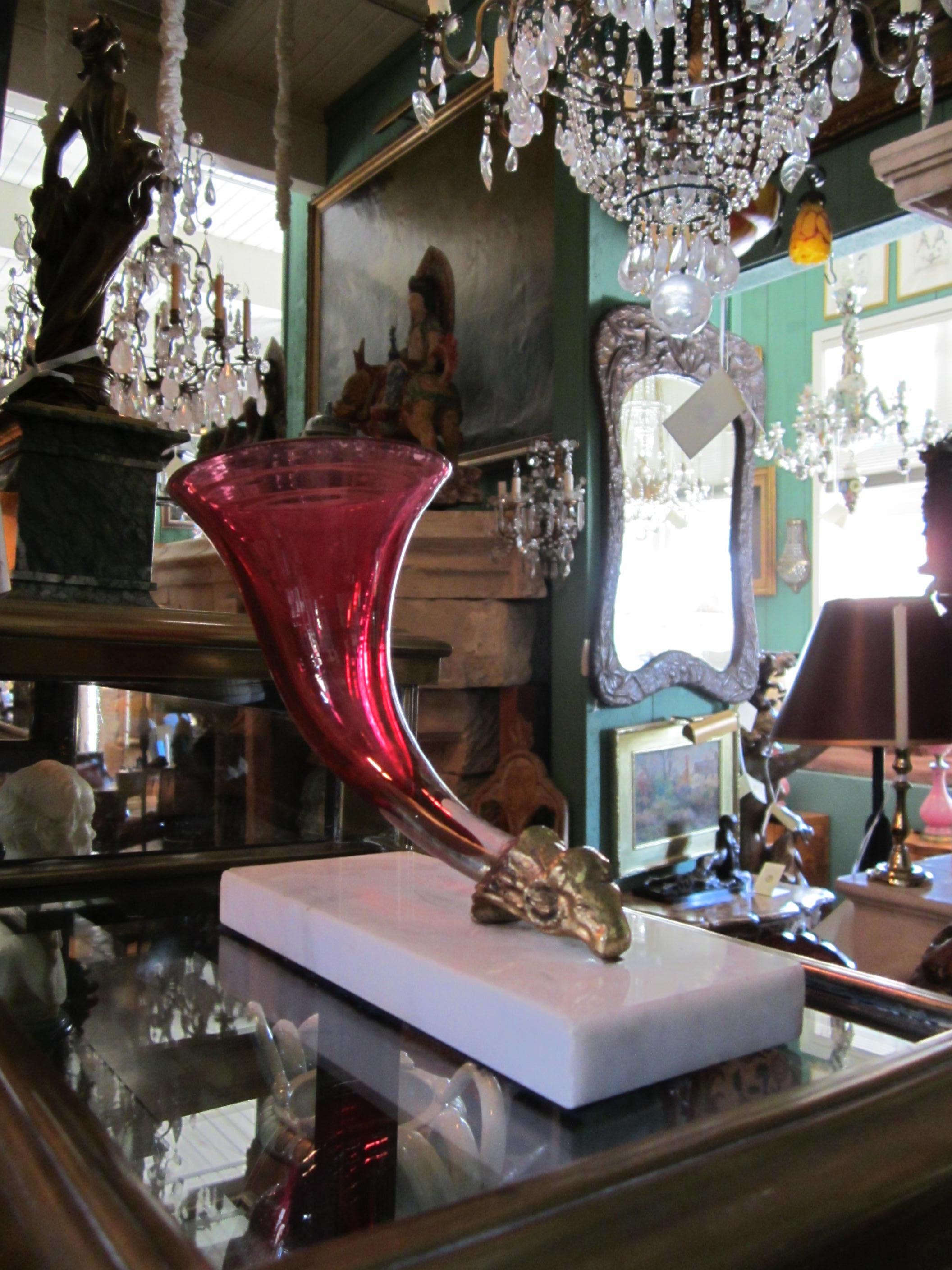 Rare pair of clear Cranberry color opaline glass Ram's Head vases
Unusual French opaline with gilt decoration Rhyton cornucopia Vases mounted with gilt bronze Ram's heads on white marble bases . Antiques dealer Los Angeles CA West Hollywood La