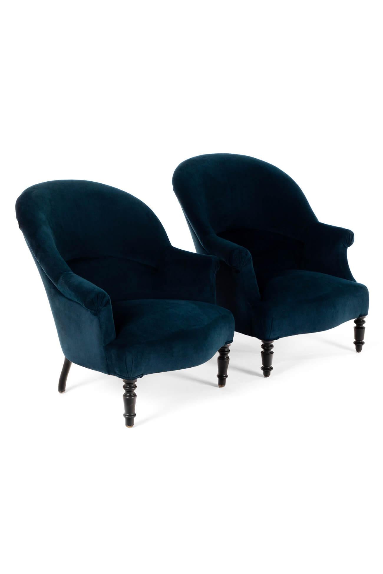 A set of late 19th century Napoleon III crapaud armchairs with wide wide generous seats raised on turned ebony legs.

The armchair has been fully restored and stripped back to the solid beech frames for upholstery with a new coil spring base, with