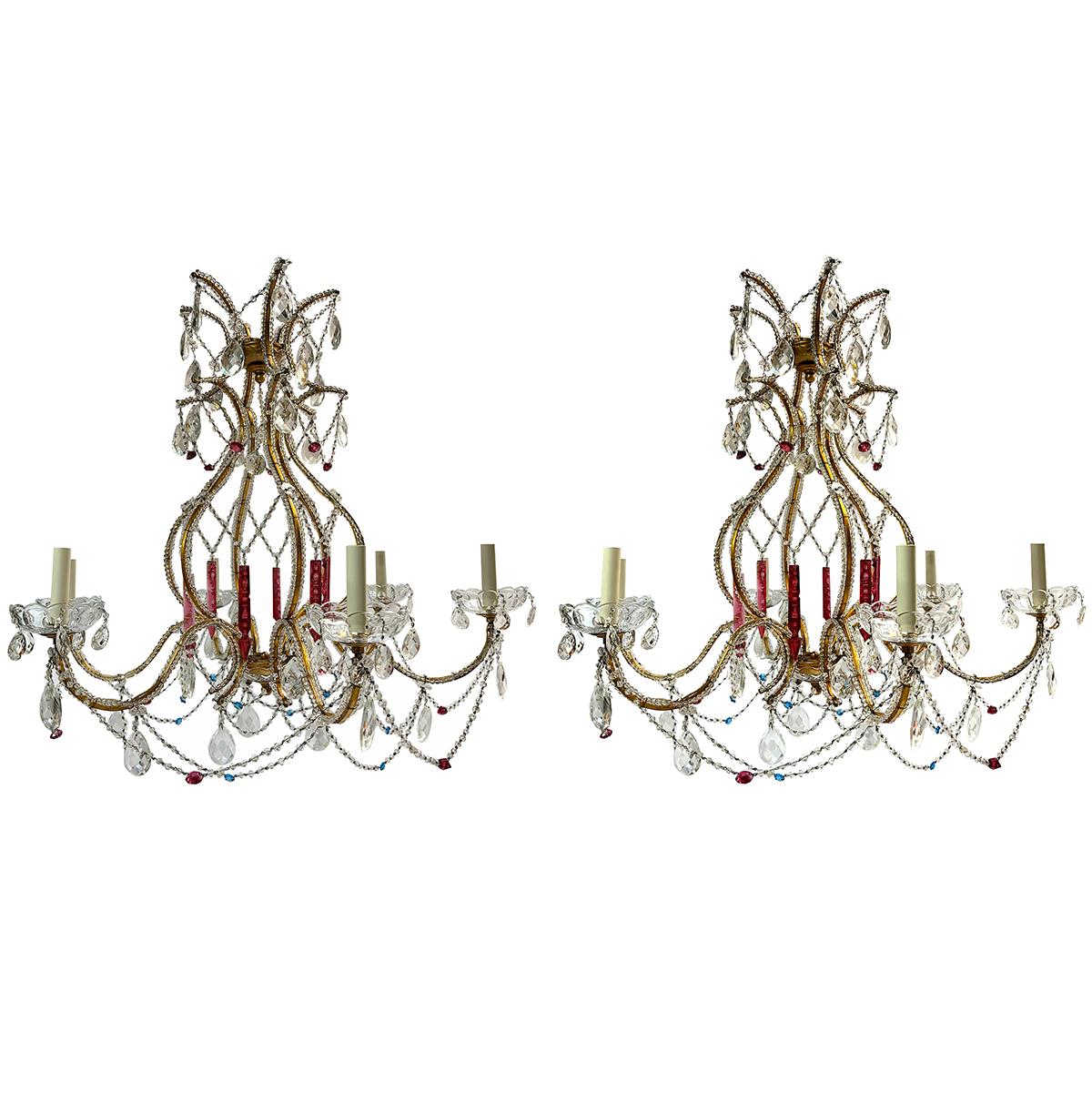 Coppia di lampadari francesi in metallo dorato e cristallo degli anni '40. 6 luci ciascuno.
Venduto singolarmente.

Misure:
Diametro: 36