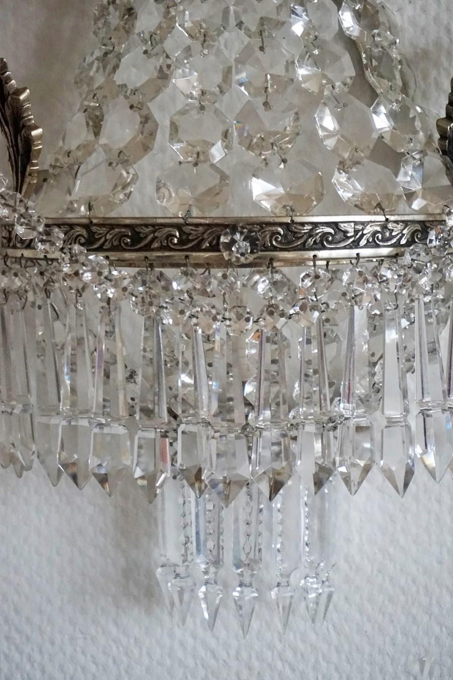 20th Century Pair of French Crystal two-Light Wall Sconces with Silvered Bronze Frame For Sale