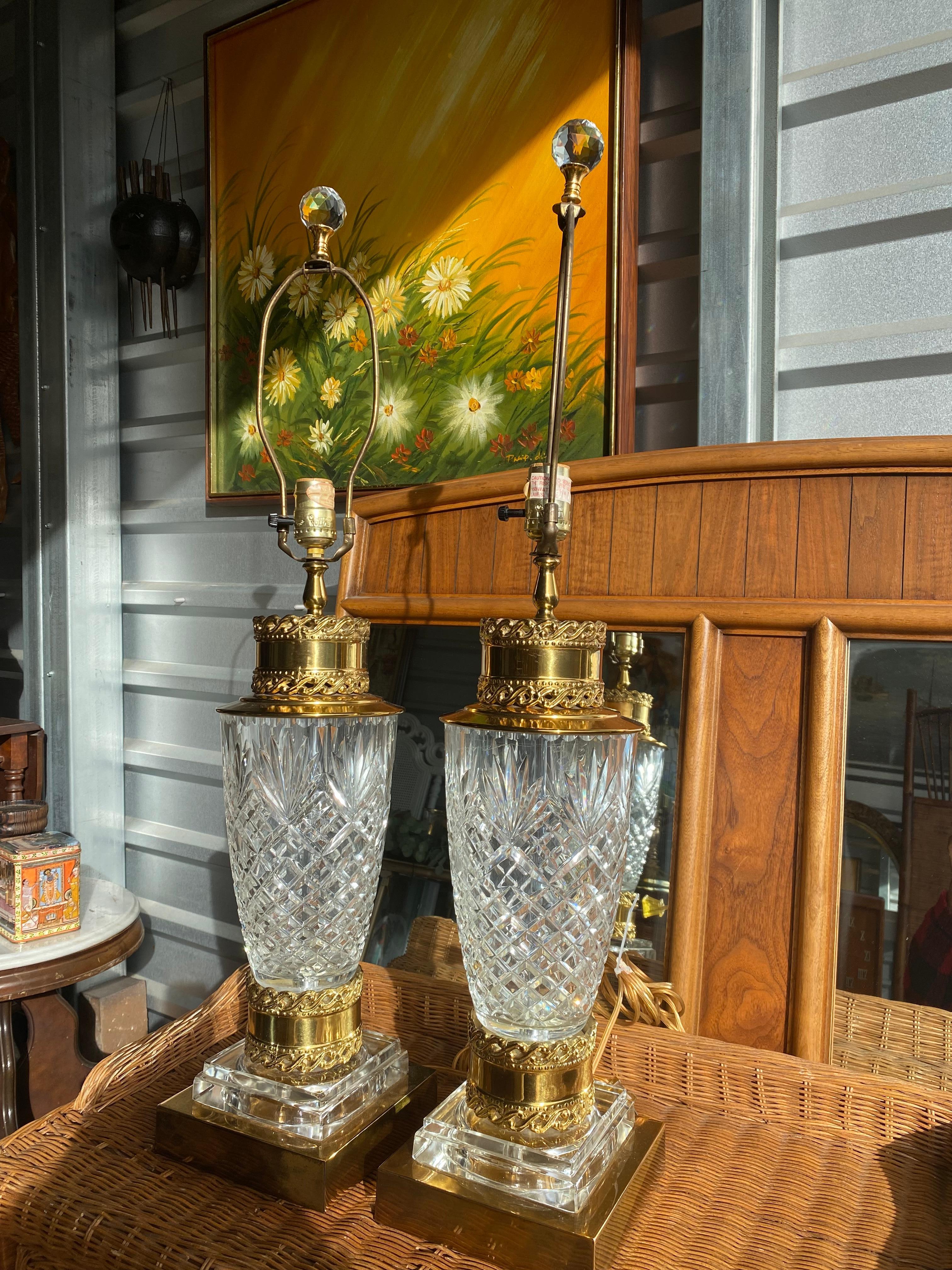 Beautiful Crystal and bronze table lamp fixtures. Boasting gorgeous gold carved detail. When the sun hits these pieces they are completely breath taking. Perfect to bring your living space to life.