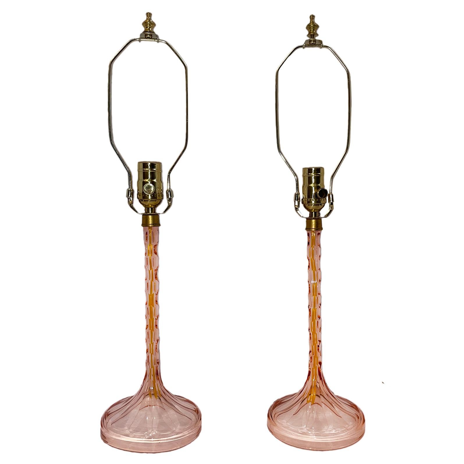 Pair of circa 1930's. French rose colored cut crystal table lamps.

Measurements:
Height of body: 12