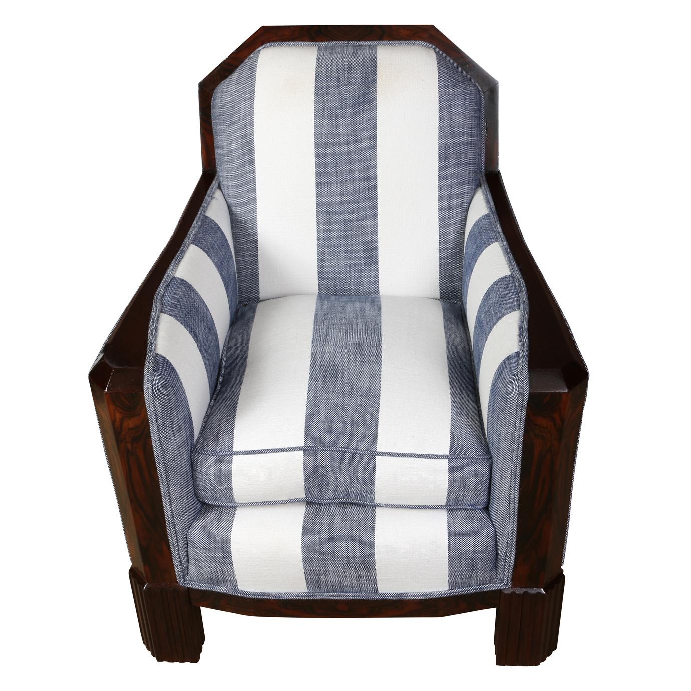 A three piece set includes a pair of French Art Deco style arm chairs with polished wood frames and a comfortable ottoman, all in a bold blue and white stripe nautical pattern.  Ottoman measures 26