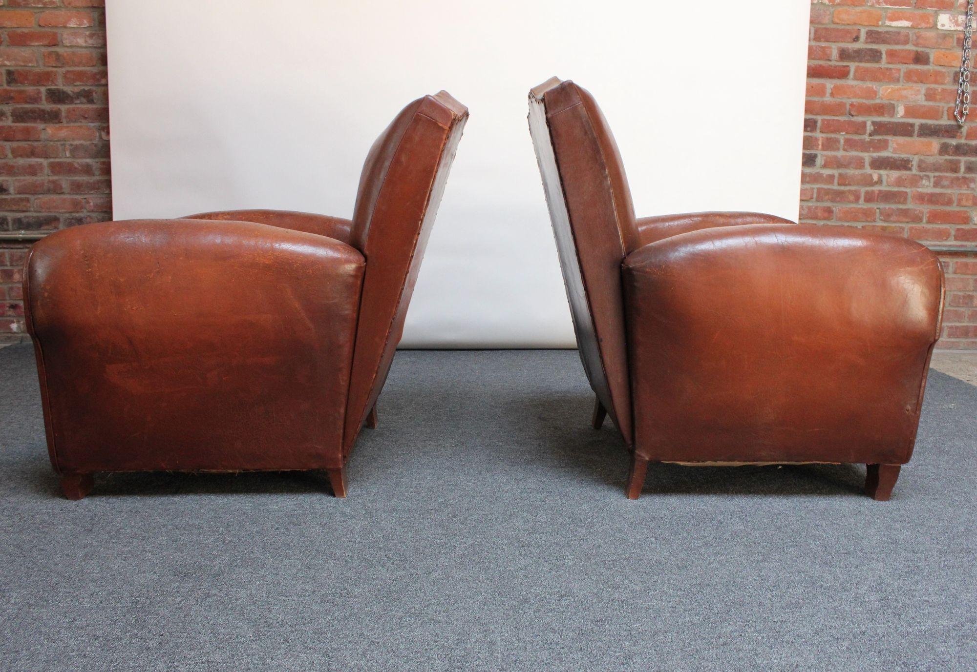 Pair of French Deco Leather 'Mustache' Club Chairs In Distressed Condition In Brooklyn, NY